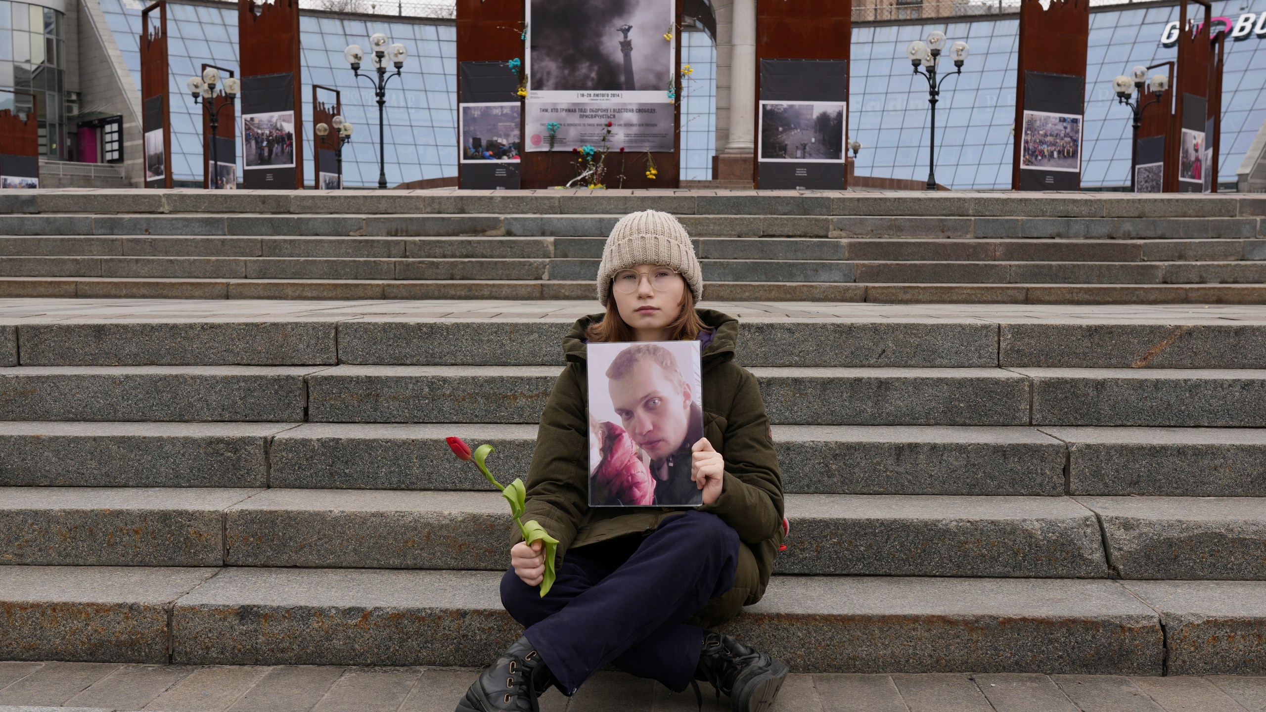 A young girl, whose family member is a Ukrainian prisoner of war attends a vigil in Maidan Square in central Kyiv, Ukraine, Saturday March 16, 2024. (AP Photo/Tony Hicks)