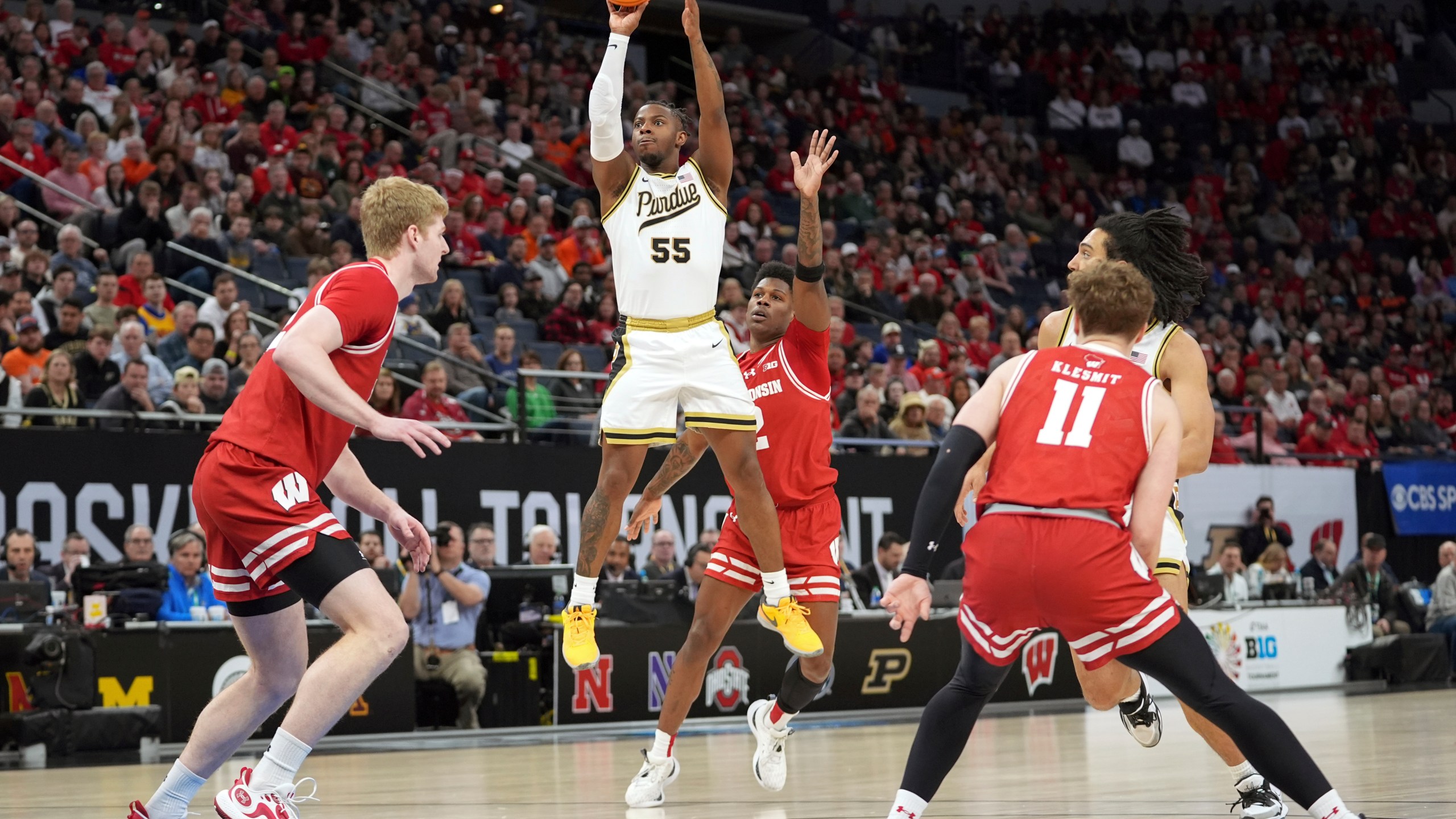 Purdue guard Lance Jones (55) shoots during the first half of an NCAA college basketball game against Wisconsin in the semifinal round of the Big Ten Conference tournament, Saturday, March 16, 2024, in Minneapolis. (AP Photo/Abbie Parr)
