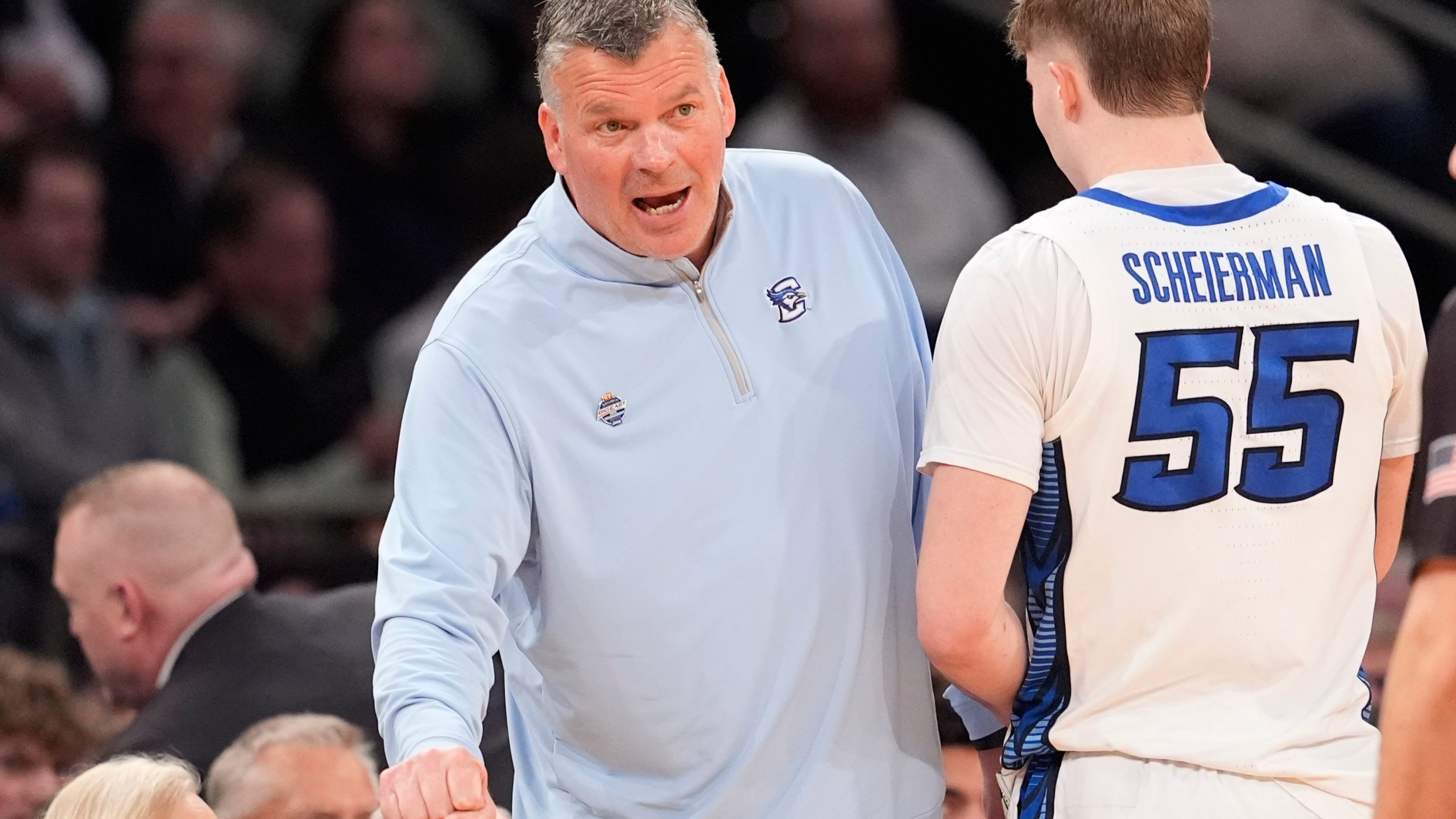 Creighton coach Greg McDermott talks to guard Baylor Scheierman during the second half of the team's NCAA college basketball game against Providence in the quarterfinals of the Big East Conference men's tournament Thursday, March 14, 2024, in New York. (AP Photo/Mary Altaffer)