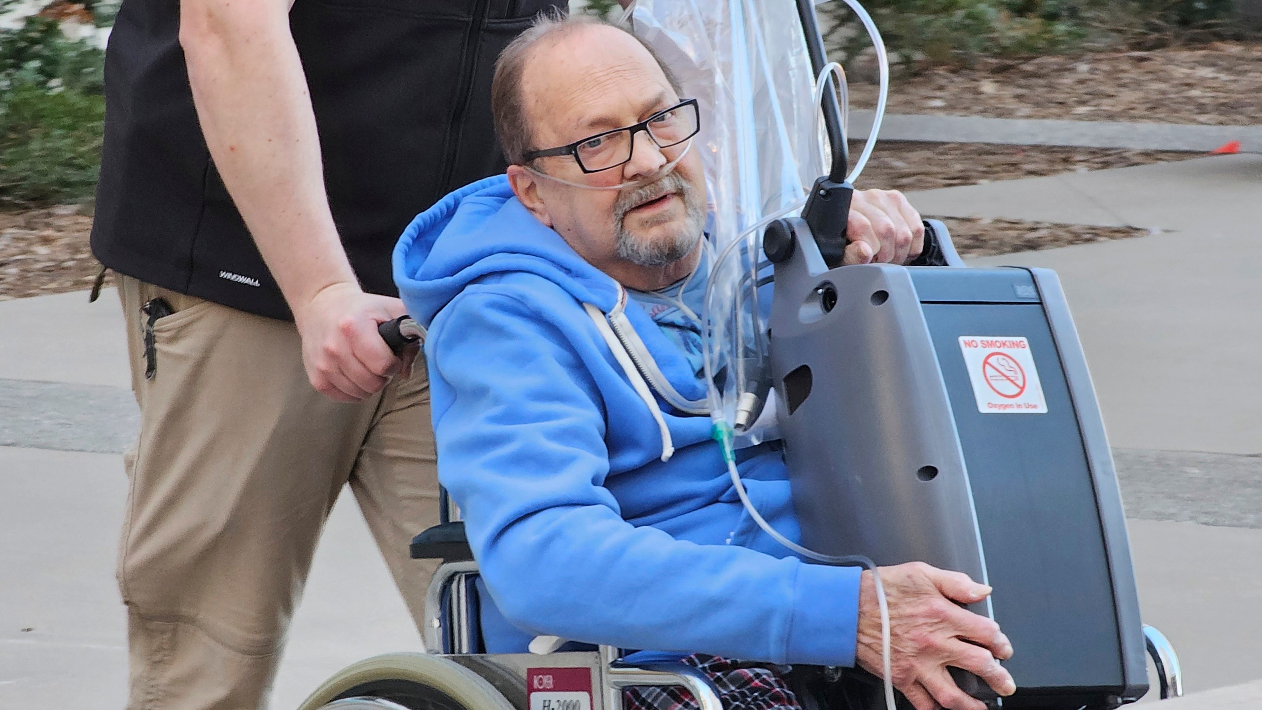 Jerry Hal Saliterman, of Crystal, Minn., is wheeled out of U.S. District Court in St. Paul, Minn., Friday, March 15, 2024, after he made his initial appearance on charges connected to the 2005 theft of a pair of ruby slippers worn by Dorothy in “The Wizard of Oz.” The FBI recovered the slippers in 2018. Another man charged in the case has already pleaded guilty and was sentenced to time served because of his ailing health. (AP Photo/Steve Karnowski)