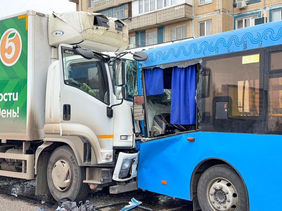 This photo released by Belgorod region governor Vyacheslav Gladkov's telegram channel on Saturday, March 16, 2024, shows a broken truck and a bus after shelling from the Ukrainian side in Belgorod, Russia. A Russian regional governor says two people have been killed in Ukrainian shelling of the city of Belgorod, close to the border with Ukraine. Three others were wounded. (Belgorod region governor Vyacheslav Gladkov telegram channel via AP)