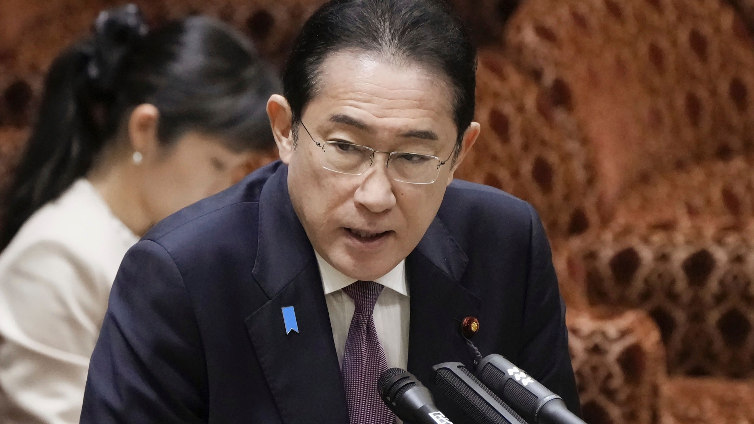 Japanese Prime Minister Fumio Kishida speaks during a parliamentary session of House of Councilors in Tokyo, Monday, March 18, 2024. Kishida told a parliamentary session that North Korea fired “a number of” ballistic missiles into the waters between the Korean Peninsula and Japan. (Kyodo News via AP)