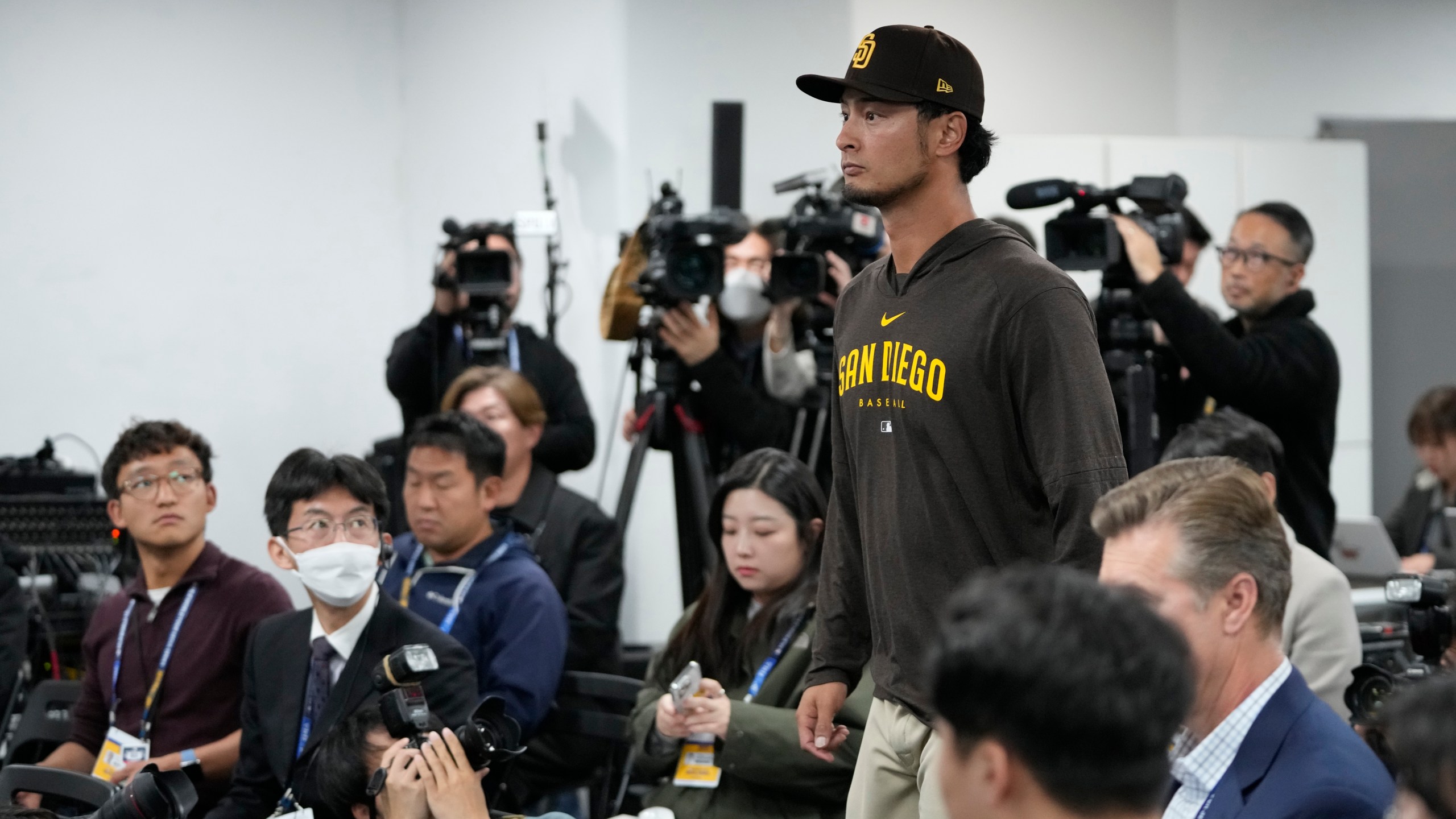 San Diego Padres' pitcher Yu Darvish arrives for a press conference at the Gocheok Sky Dome in Seoul, South Korea, Monday, March 18, 2024. (AP Photo/Lee Jin-man)