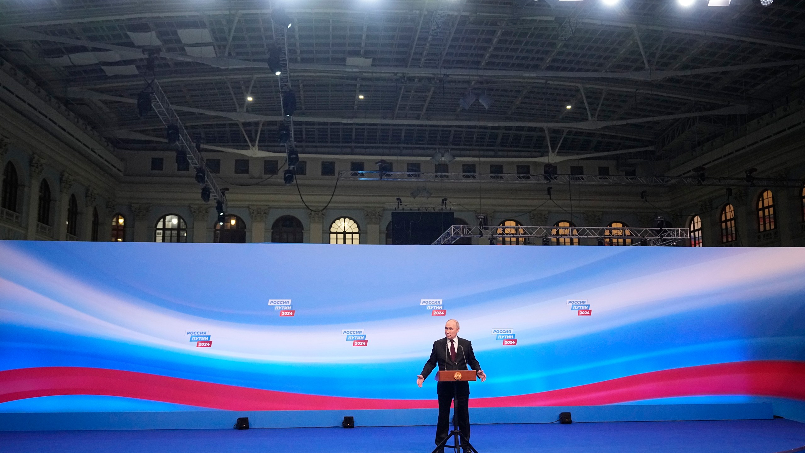 Russian President Vladimir Putin speaks on a visit to his campaign headquarters after a presidential election in Moscow in Moscow, Russia, early Monday, March 18, 2024. (AP Photo/Alexander Zemlianichenko)