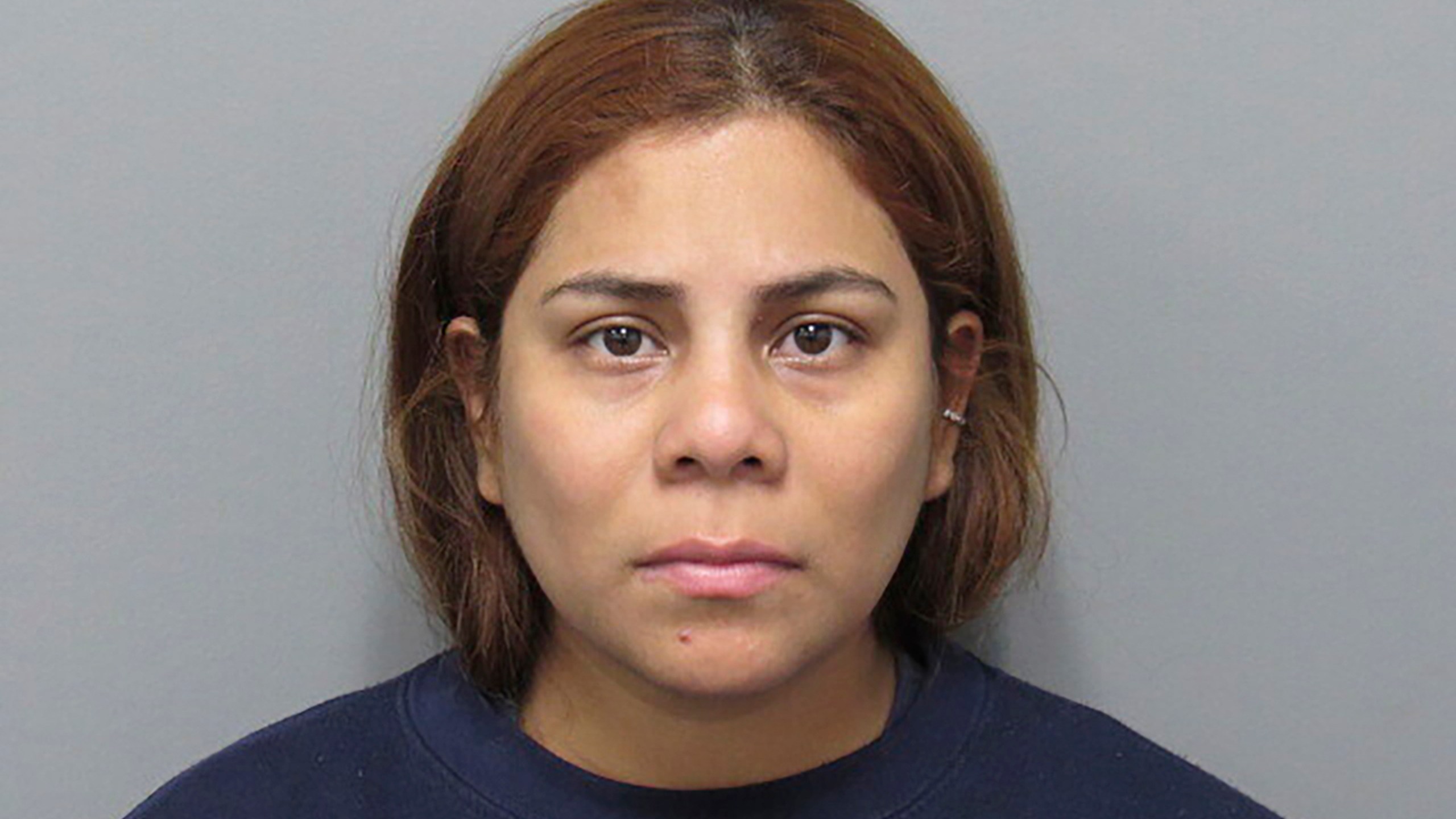 FILE - This booking photo provided by the Cuyahoga County, Ohio, Sheriff's Department shows Kristel Candelario, of Cleveland, Ohio. The Ohio mother whose 16-month-old daughter died after being left home alone in a playpen for 10 days last summer while she went on vacation was sentenced Monday, March 18, 2024, to life in prison with no chance of parole. (Cuyahoga County Sheriff's Department via AP, File)