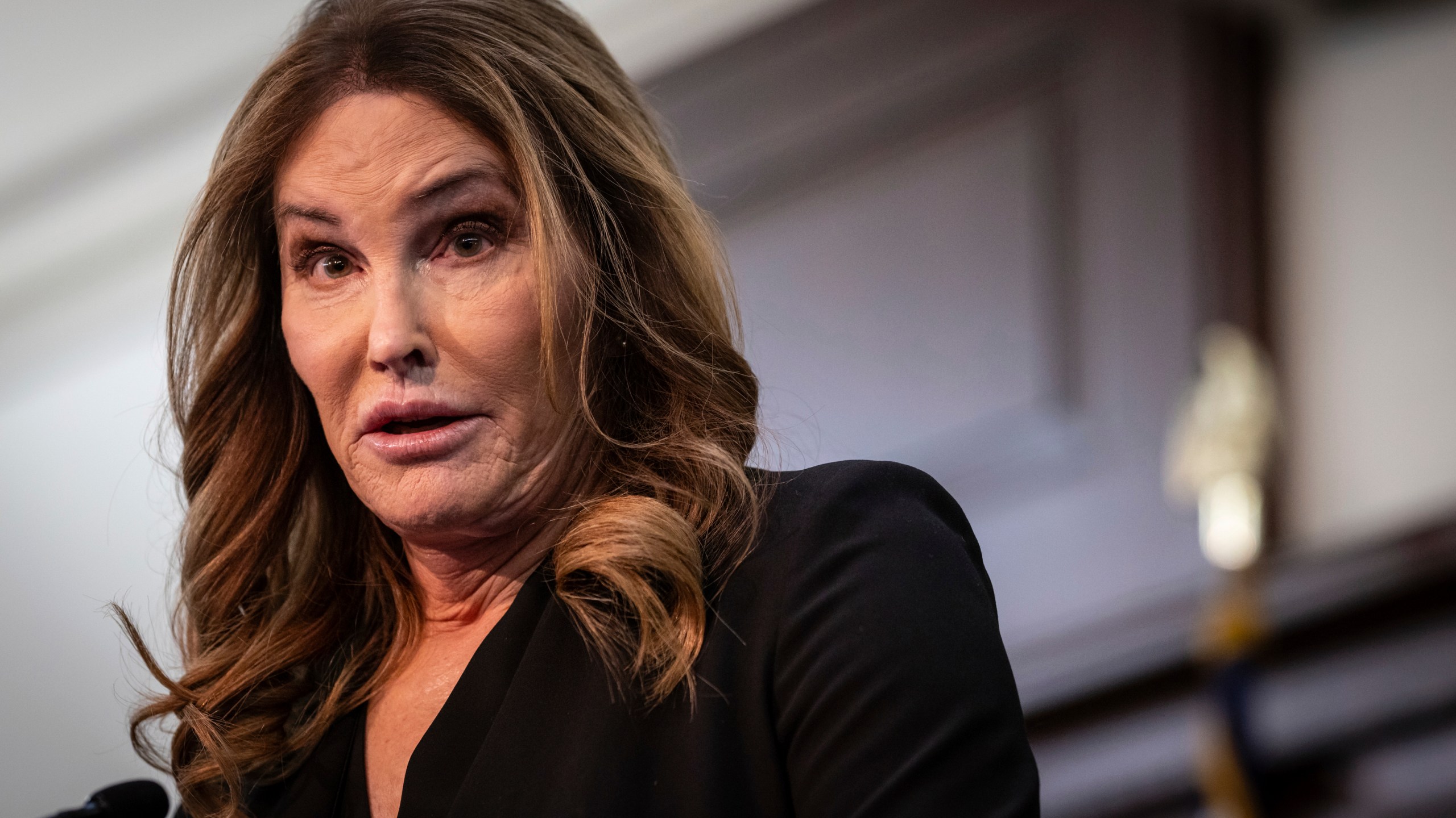 Caitlyn Jenner speaks at a press conference, Monday, March 18, 2024, in Mineola, N.Y. The former Olympic gold medalist threw her support behind a local New York official’s order banning female sports teams with transgender athletes from using county-owned facilities. (AP Photo/Stefan Jeremiah)