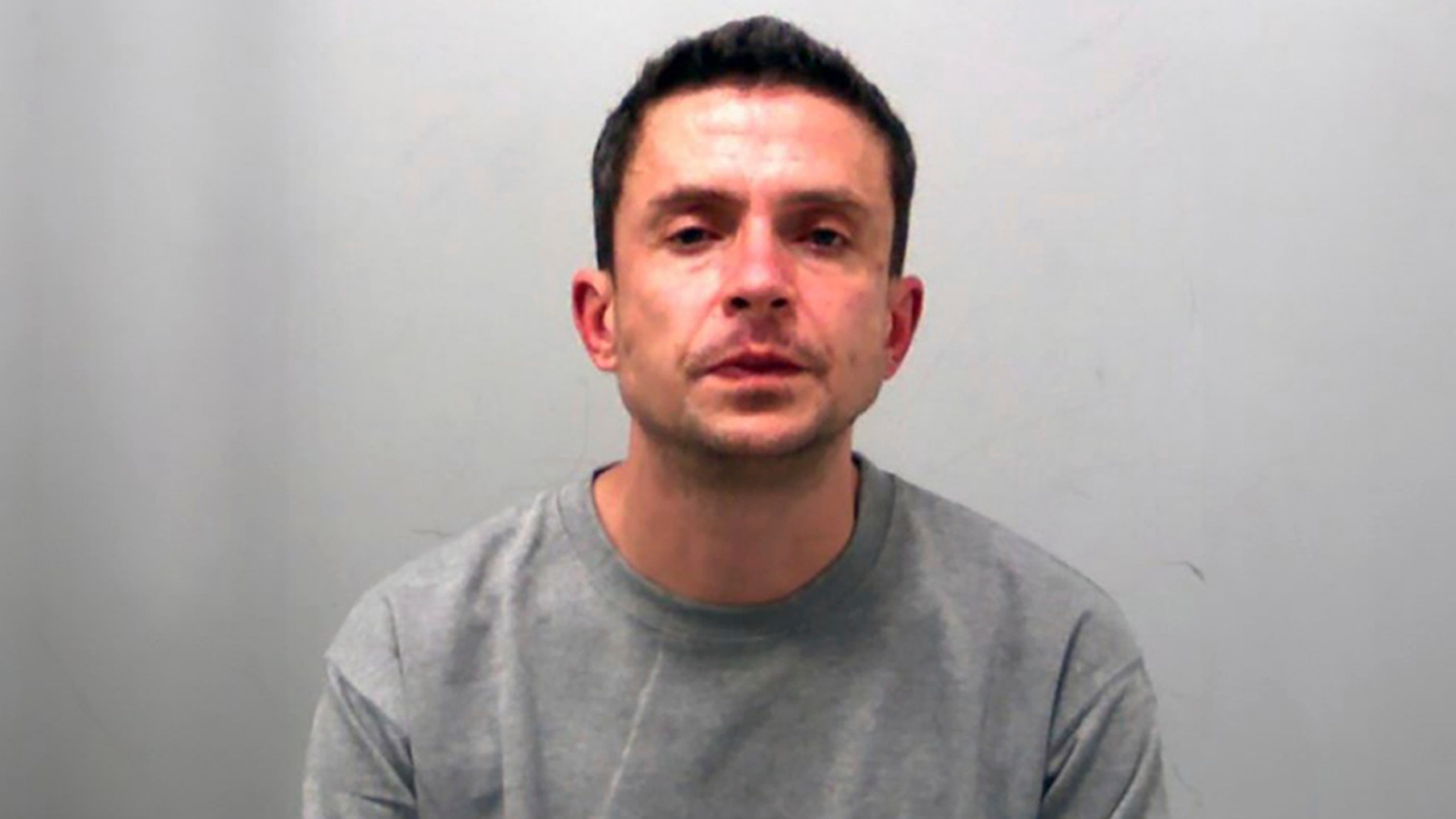 This undated photo issued by Essex Police on Tuesday March 19, 2024 shows Nicholas Hawkes, 39, a convicted sex offender who sent unsolicited photos of his genitals to a girl and a woman, was the first person in England and Wales convicted of violating the Online Safety Act. England's first convicted cyber-flasher was sentenced Tuesday to 5 1/2 years in prison. (Essex Police via AP)