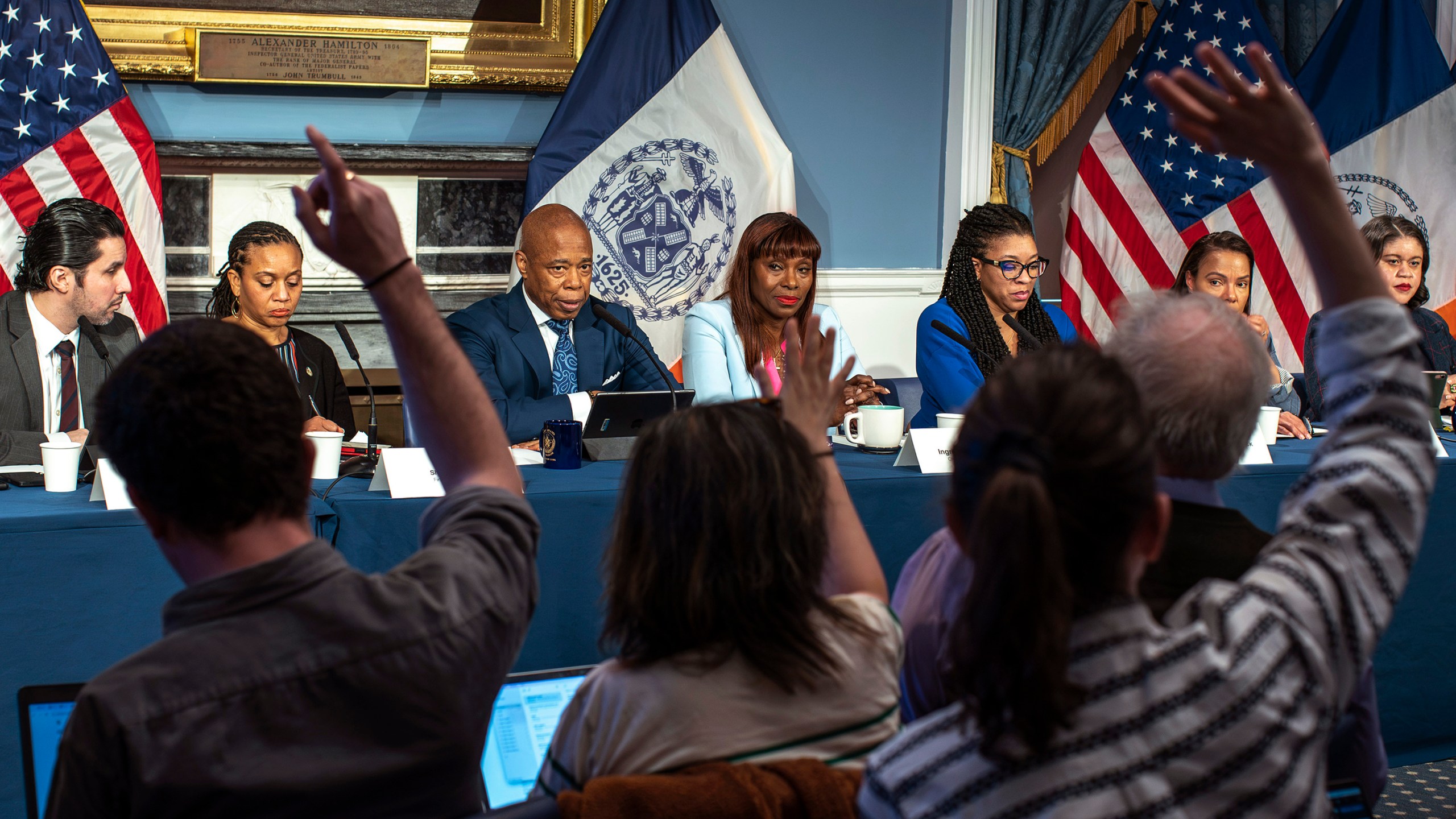 New York City Mayor Eric Adams, third left, listens to questions from the media during a news conference at City Hall in New York, Tuesday, March 19, 2024. (AP Photo/Eduardo Munoz Alvarez)