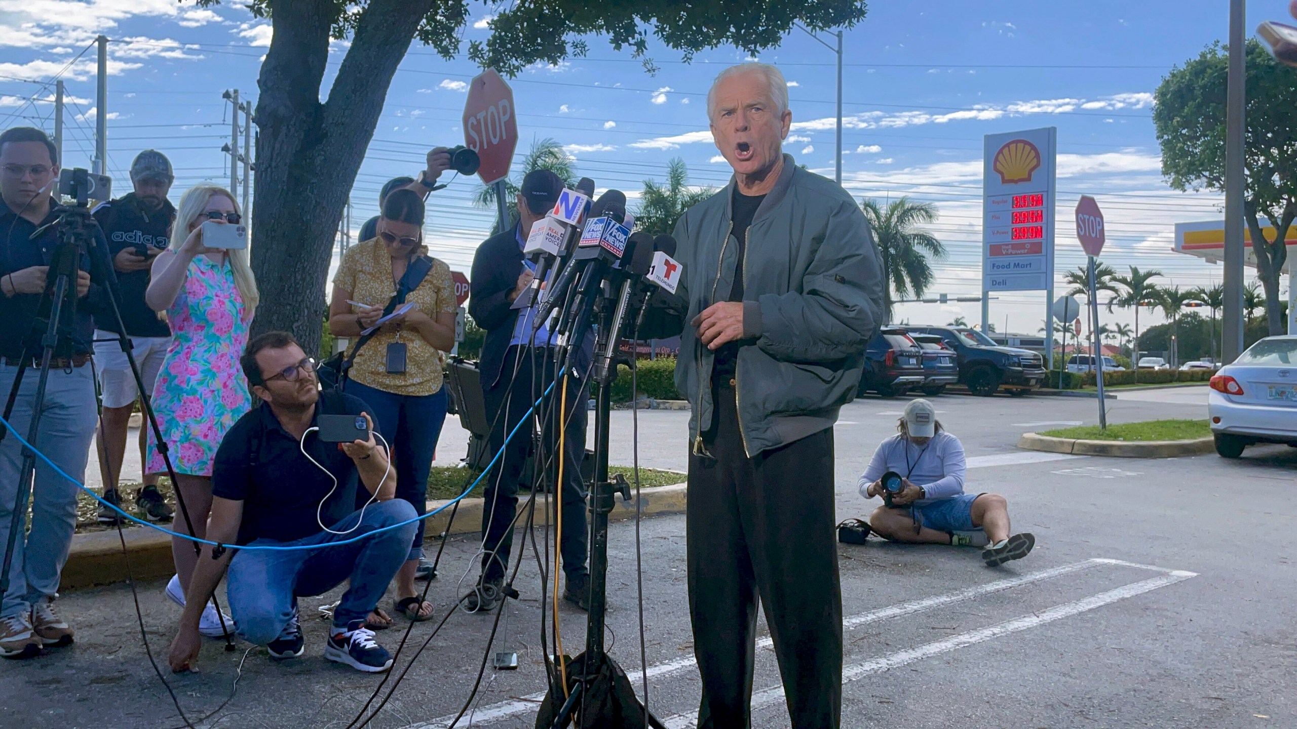 Former Trump White House official Peter Navarro speaks to reporters before he heads to prison, Tuesday, March 19, 2024 in Miami, to begin serving his sentence for refusing to cooperate with a congressional investigation into the Jan. 6, 2021, attack on the U.S. Capitol. (AP Photos/Adriana Gomez Licon)