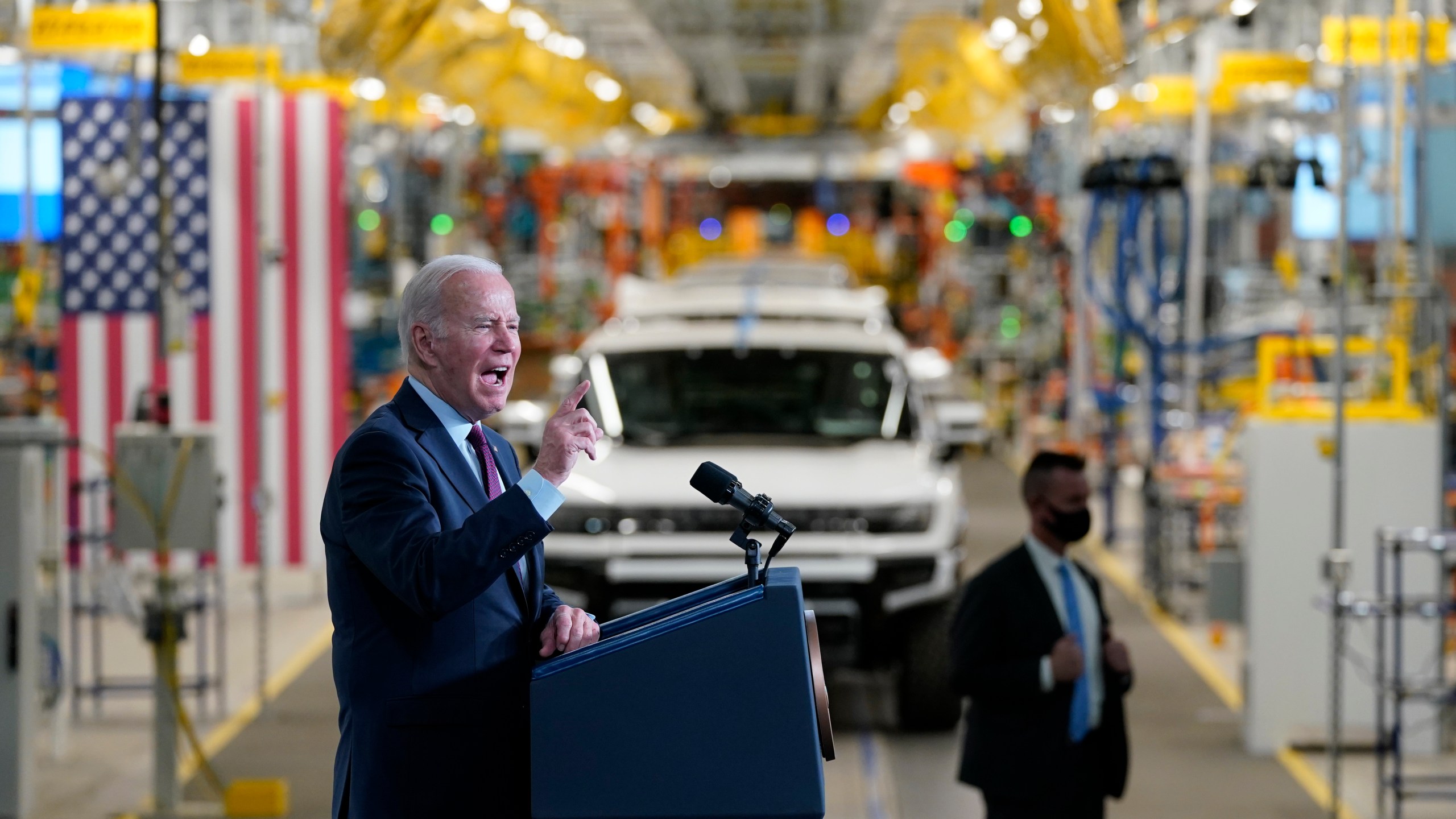 FILE - President Joe Biden speaks during a visit to the General Motors Factory ZERO electric vehicle assembly plant, Nov. 17, 2021, in Detroit. The Biden administration this week is expected to announce new automobile emissions standards that relax proposed limits in the next few years but reach the same strict standards outlined by the Environmental Protection Agency last year. (AP Photo/Evan Vucci, File)