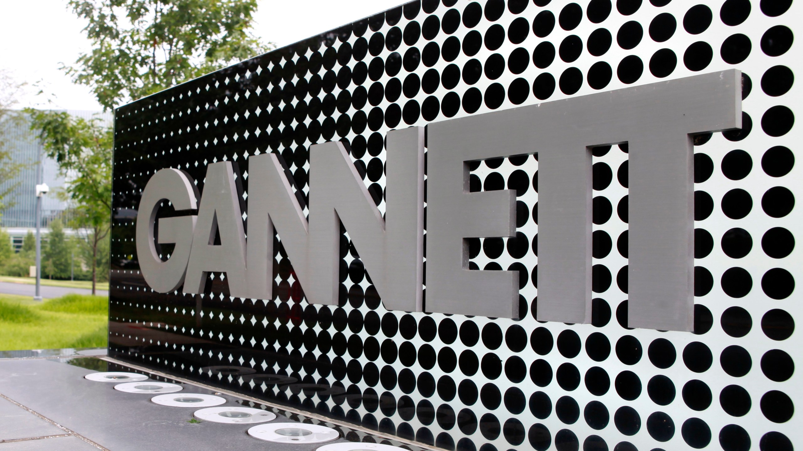 FILE - The Gannett Co. headquarters sign is seen, July 14, 2010, in McLean, Va. The media company Gannett, publishers of USA Today and owner of the nation's largest newspaper chain, said Tuesday, March 19, 2024, that it would stop using journalism from The Associated Press later this month, severing a century-old partnership. (AP Photo/Jacquelyn Martin, File)