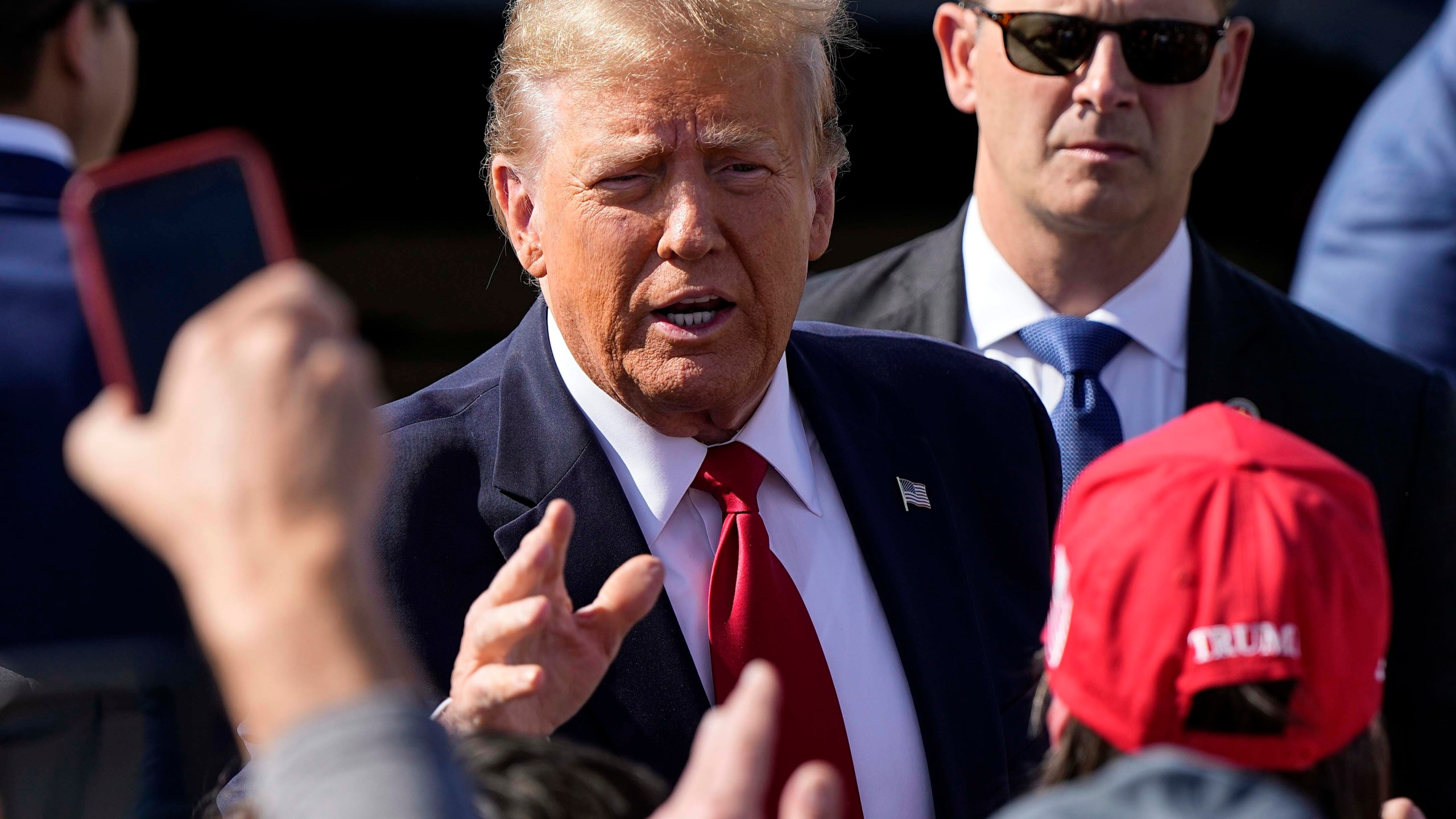 Republican presidential candidate former president Donald Trump speaks to supporters after arriving to Cerulean General Aviation, Tuesday, Feb. 20, 2024, in Greer, S.C. Trump will participate in a town hall event in Greenville, S.C. (AP Photo/Mike Stewart)