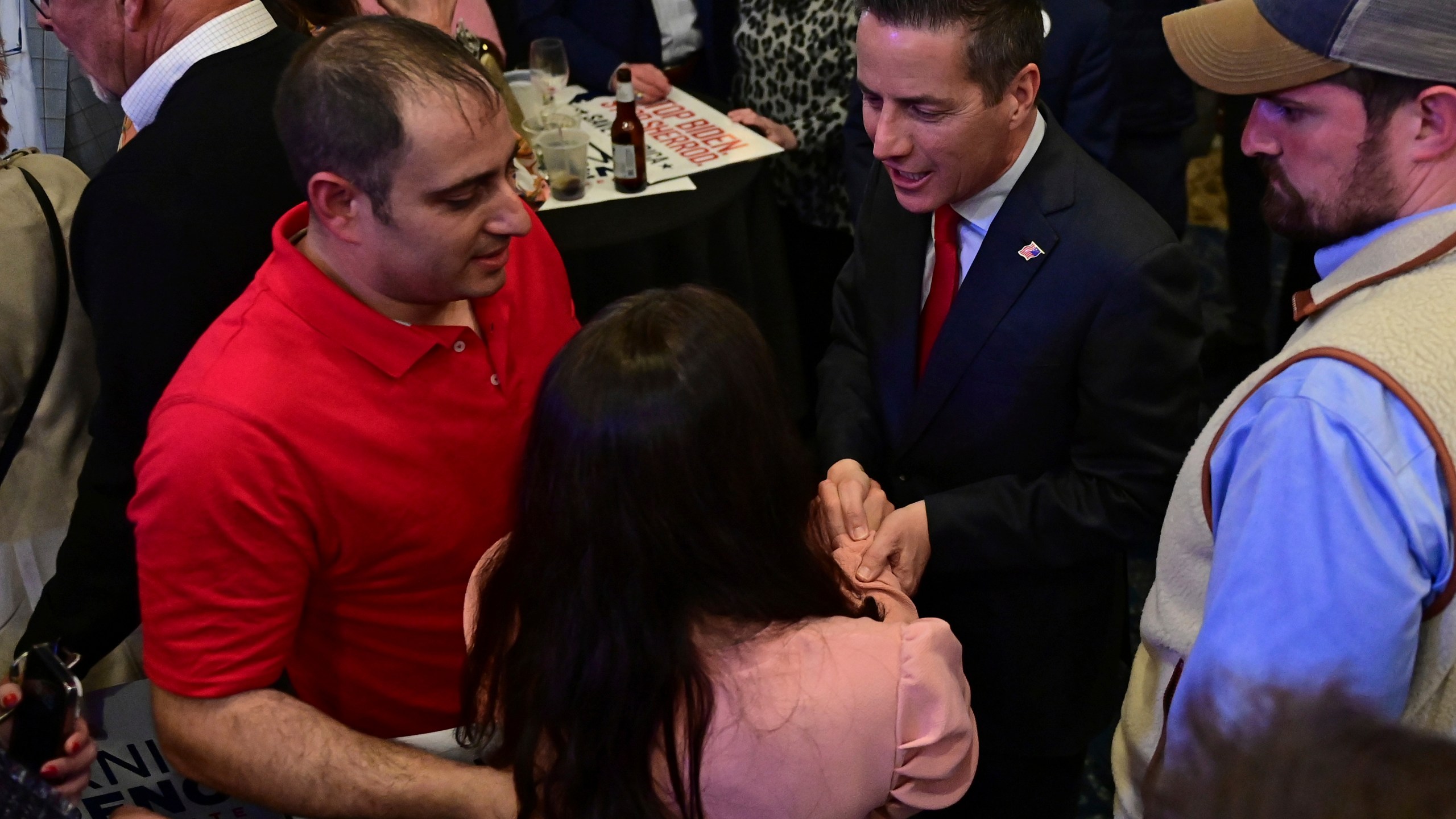 Cleveland businessman Bernie Moreno, a Republican candidate for U.S. Senate, shakes hands with a supporter during his primary election night watch party in Westlake, Ohio, Tuesday, March 19, 2024. (AP Photo/David Dermer)
