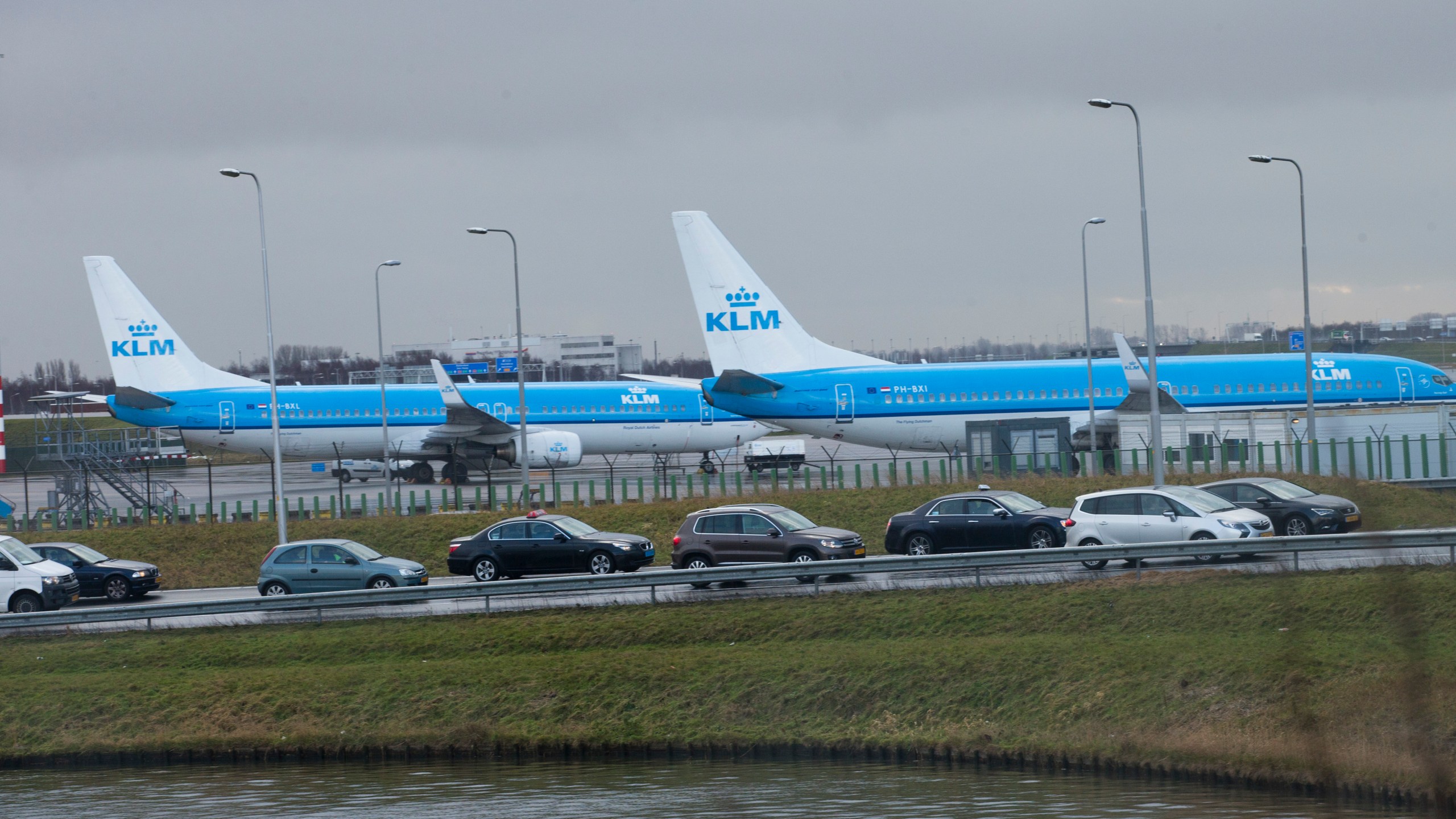 FILE - KLM airplanes sit in Schiphol Airport near Amsterdam, Netherlands, on Jan. 18, 2018. The Dutch government has systematically put the interests of the aviation sector above those of people who live near Schiphol Airport, one of Europe's busiest aviation hubs, a Dutch court ruled Wednesday, saying that the treatment of local residents amounts to a breach of Europe's human rights convention. (AP Photo/Peter Dejong, File)