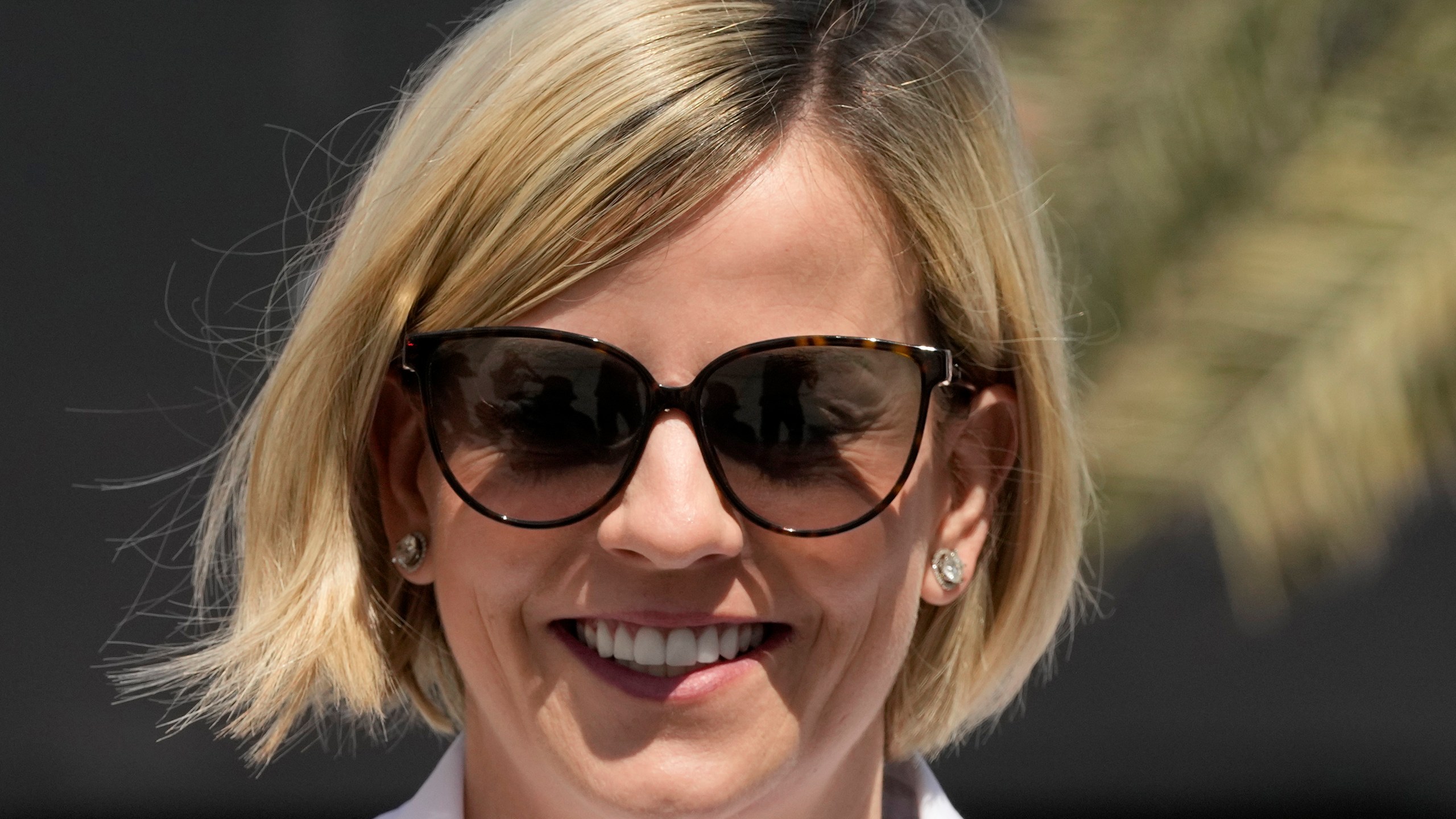 FILE - Susie Wolff, current managing director of the F1 Academy arrives at the Bahrain International Circuit in Sakhir, Bahrain, Thursday, March 2, 2023. Susie Wolff, the wife of Mercedes team boss Toto Wolff said Wednesday, March 20, 2024 she has filed a criminal complaint in the French courts “in relation to statements made about me” by Formula 1's governing body.(AP Photo/Frank Augstein, File)