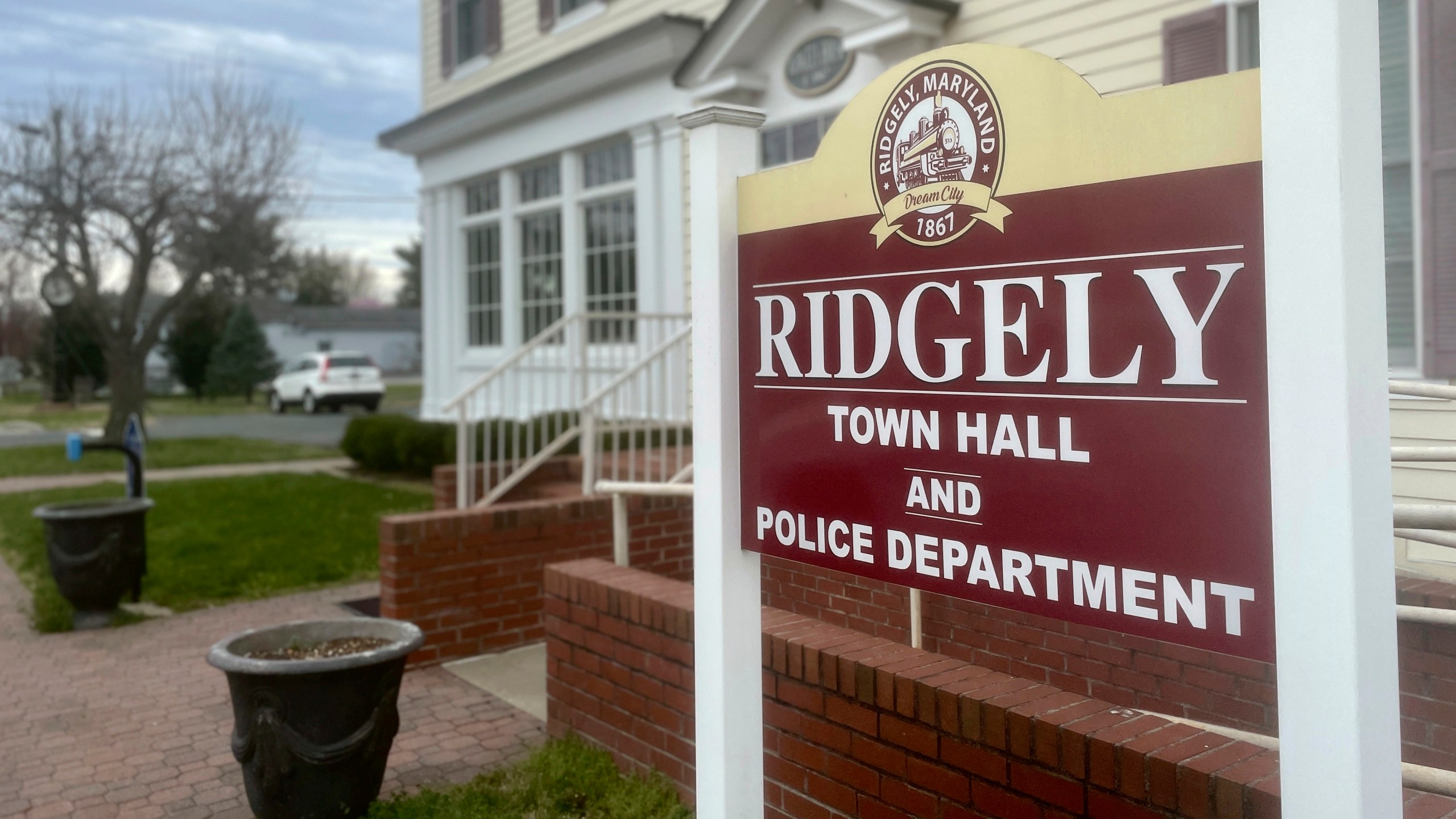 The sign outside the town government and police department offices stands in Ridgely, Md., Friday, March 15, 2024. Ridgely officials announced last week that their entire police department had been suspended pending the results of an investigation by state prosecutors. (AP Photo/Lea Skene)