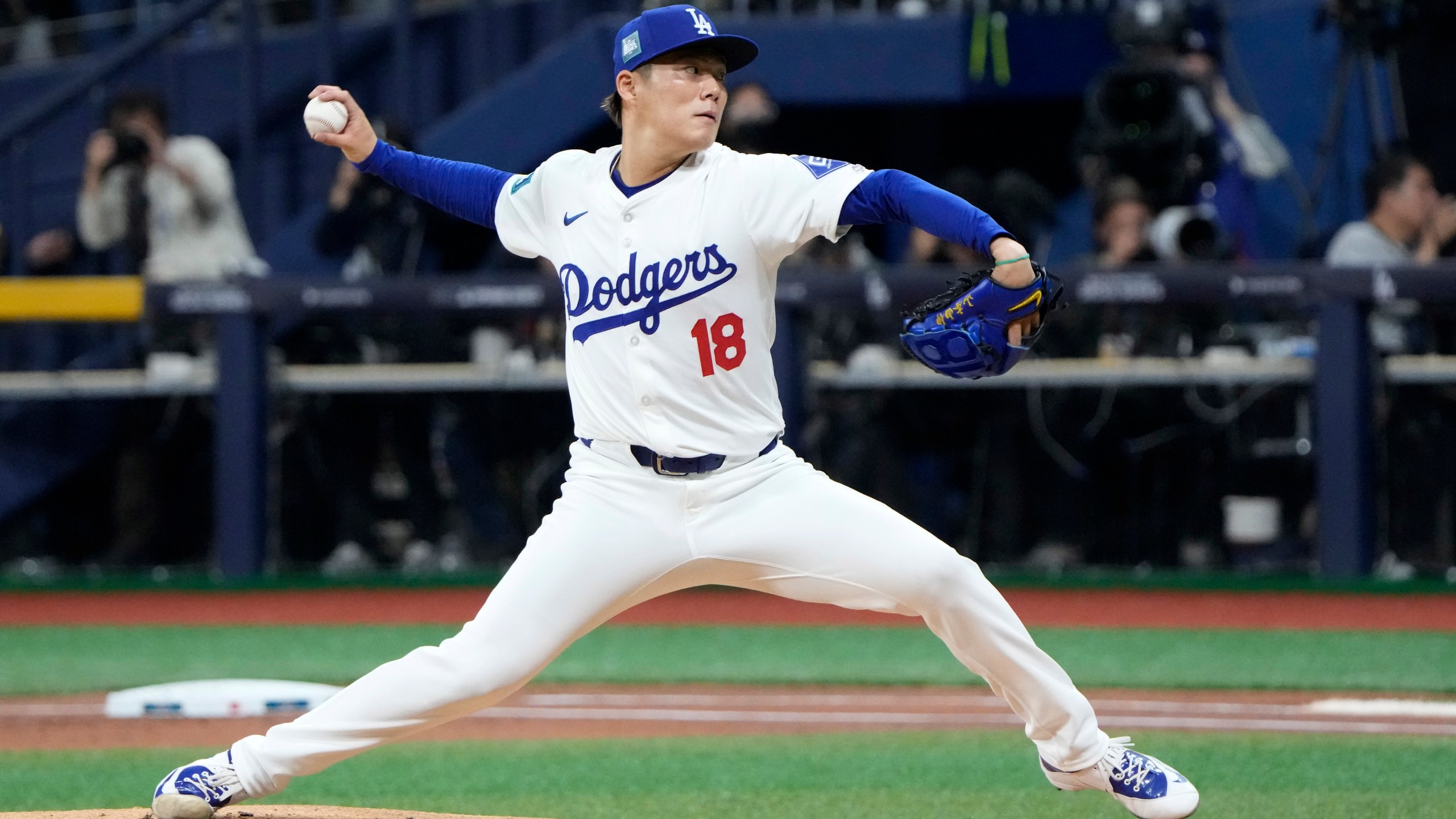 Los Angeles Dodgers starting pitcher Yoshinobu Yamamoto throws to the plate during the first inning of a baseball game against the San Diego Padres at the Gocheok Sky Dome in Seoul, South Korea Thursday, March 21, 2024, in Seoul, South Korea. (AP Photo/Ahn Young-joon)