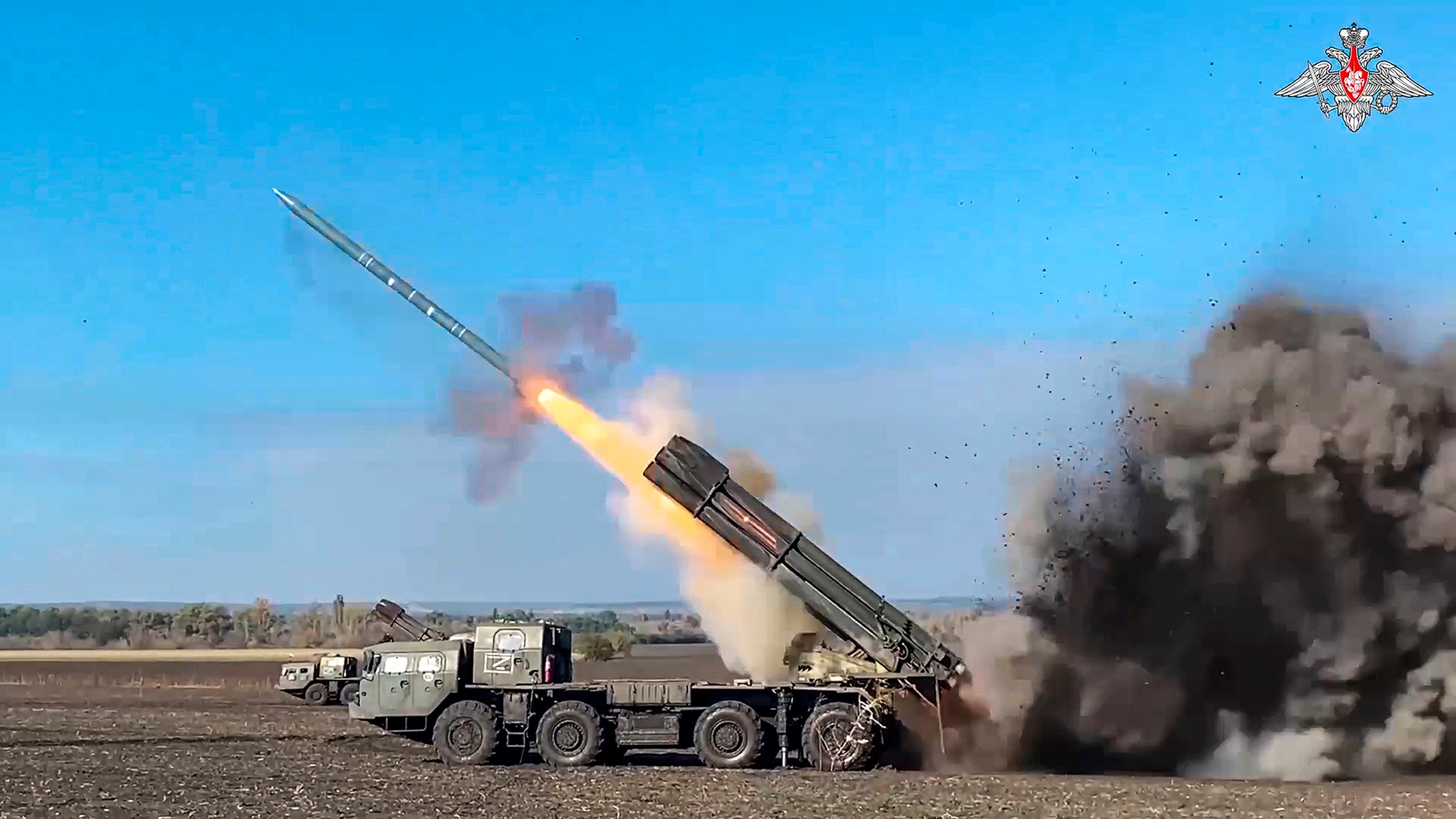 In this image taken from video released by the Russian Defense Ministry Press Service on Thursday, March 21, 2024, a Russian self-propelled 300 mm multiple rocket launcher "Smerch" fires rockets towards Ukrainian position, in an undisclosed location, in Ukraine. (Russian Defense Ministry Press Service via AP)