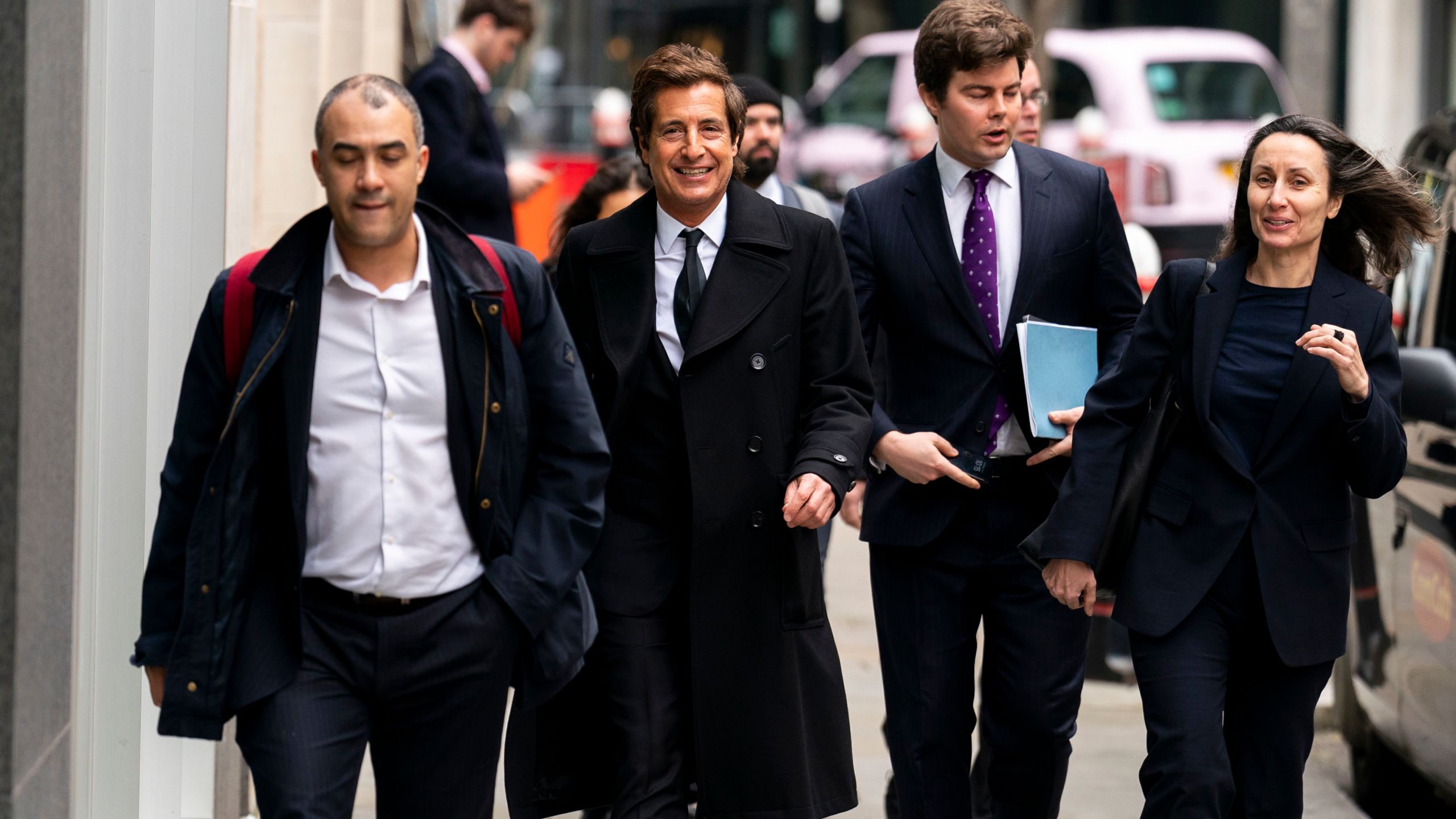 Attorney David Sherborne, second from left, at the Rolls Buildings, central London, Wednesday March 20, 2024. Prince Harry alleged Thursday, March 21, 2024, that the publisher of The Sun tabloid unlawfully intercepted phone calls of his late mother, Princess Diana, and father, now King Charles III, as he sought to expand his privacy invasion lawsuit against News Group Newspapers. (Jordan Pettitt/PA via AP)
