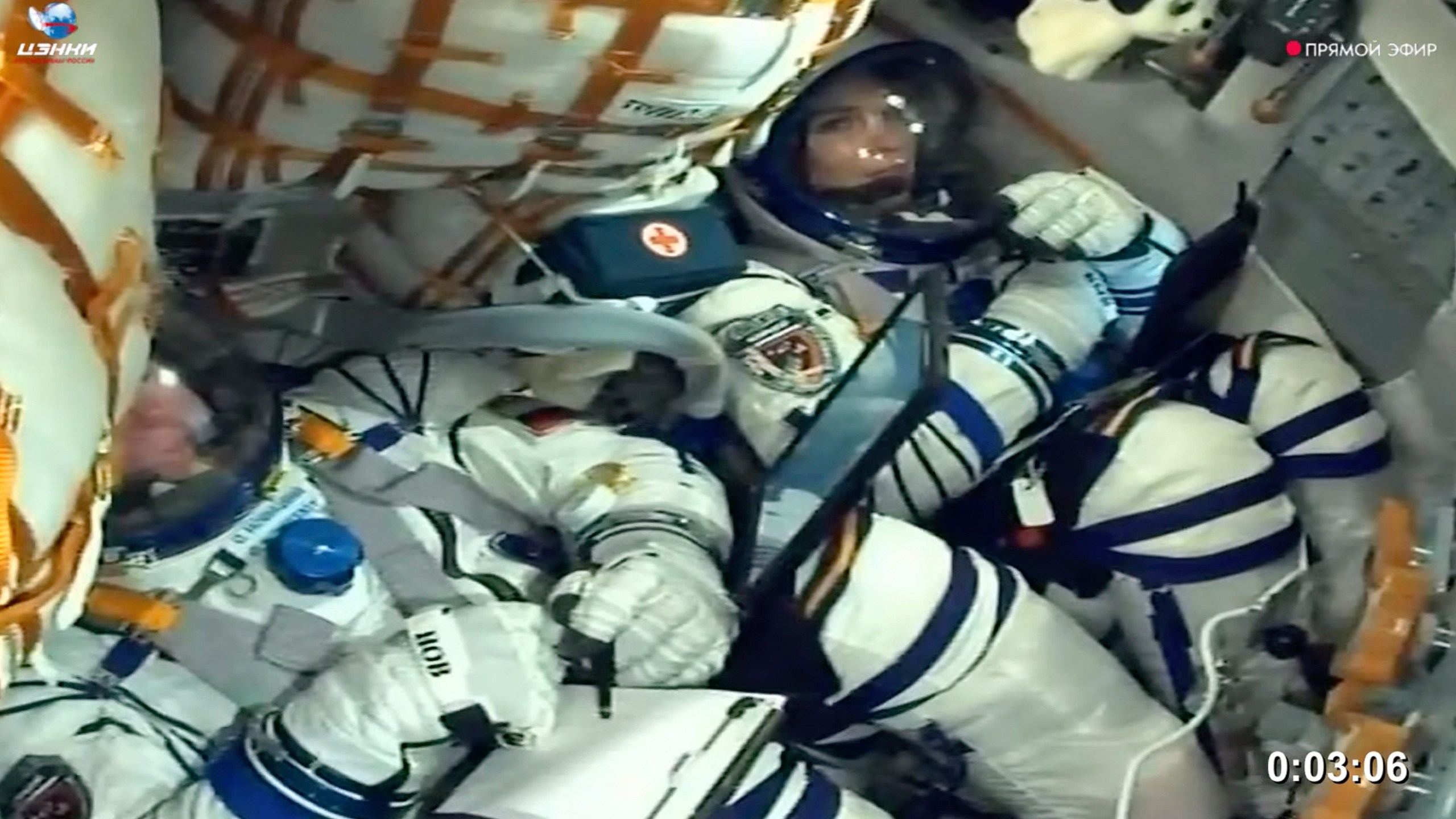 In this photo taken from video released by Roscosmos space corporation, Oleg Novitsky, cosmonaut of Roscosmos and Marina Vasilevskaya, cosmonaut of Belarus sit in the Soyuz MS-25 space ship prior to the cancellation of the launch at the Russian leased Baikonur cosmodrome, Kazakhstan, Thursday, March 21, 2024. Russia's Roscosmos space agency has aborted the launch of three astronauts to the International Space Station about 20 seconds before they were scheduled to lift off. Officials say the crew is safe. The Russian Soyuz rocket was to carry NASA astronaut Tracy Dyson, Oleg Novitsky of Roscosmos and Marina Vasilevskaya of Belarus from the Russia-leased Baikonur launch facility in Kazakhstan. (Roscosmos space corporation via AP)