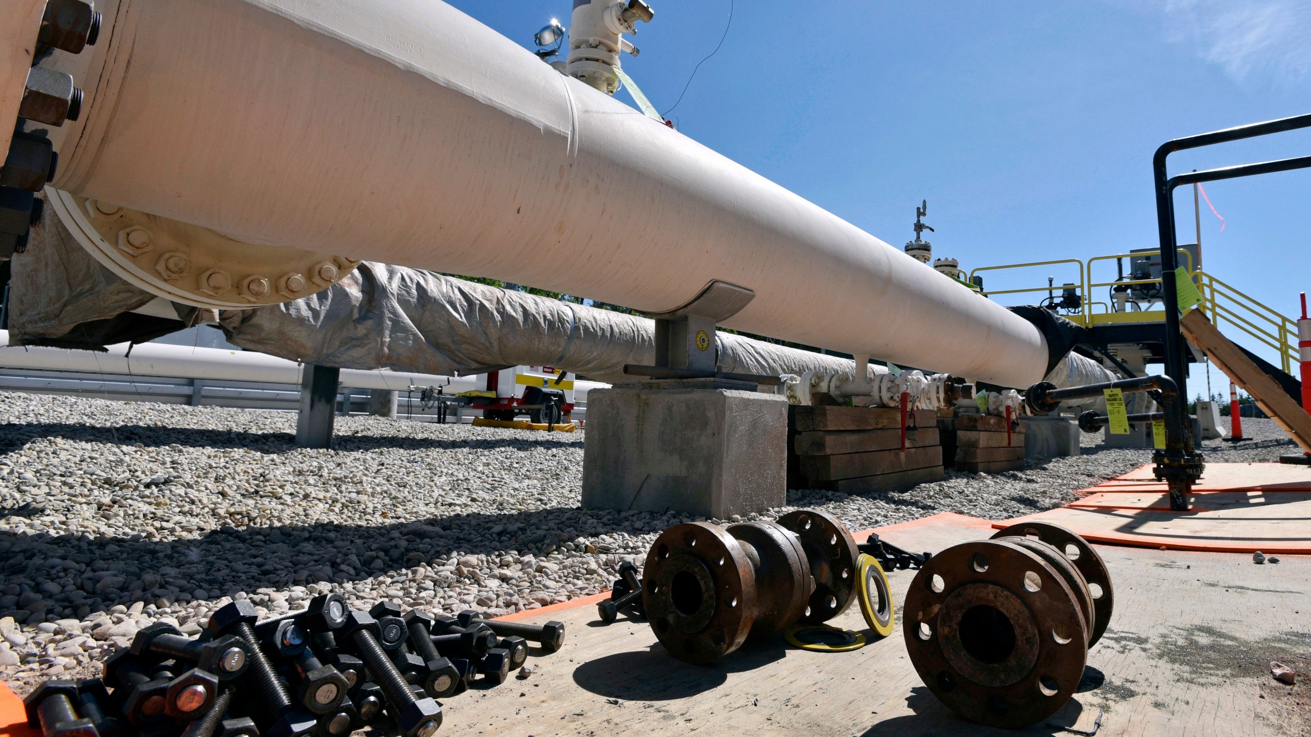 FILE - Nuts, bolts and fittings are ready to be added to the east leg of the pipeline near St. Ignace, Mich., as Enbridge Inc., prepares to test the east and west sides of the Line 5 pipeline under the Straits of Mackinac in Mackinaw City, Mich., June 8, 2017. Michigan attorneys pressed a federal appellate panel Thursday, March 21, 2024, to move their lawsuit seeking to shut down the portion of an aging pipeline running beneath the Straits of Mackinac from federal to state court, arguing that the state's environmental protection laws are in play. (Dale G Young/Detroit News via AP, File)
