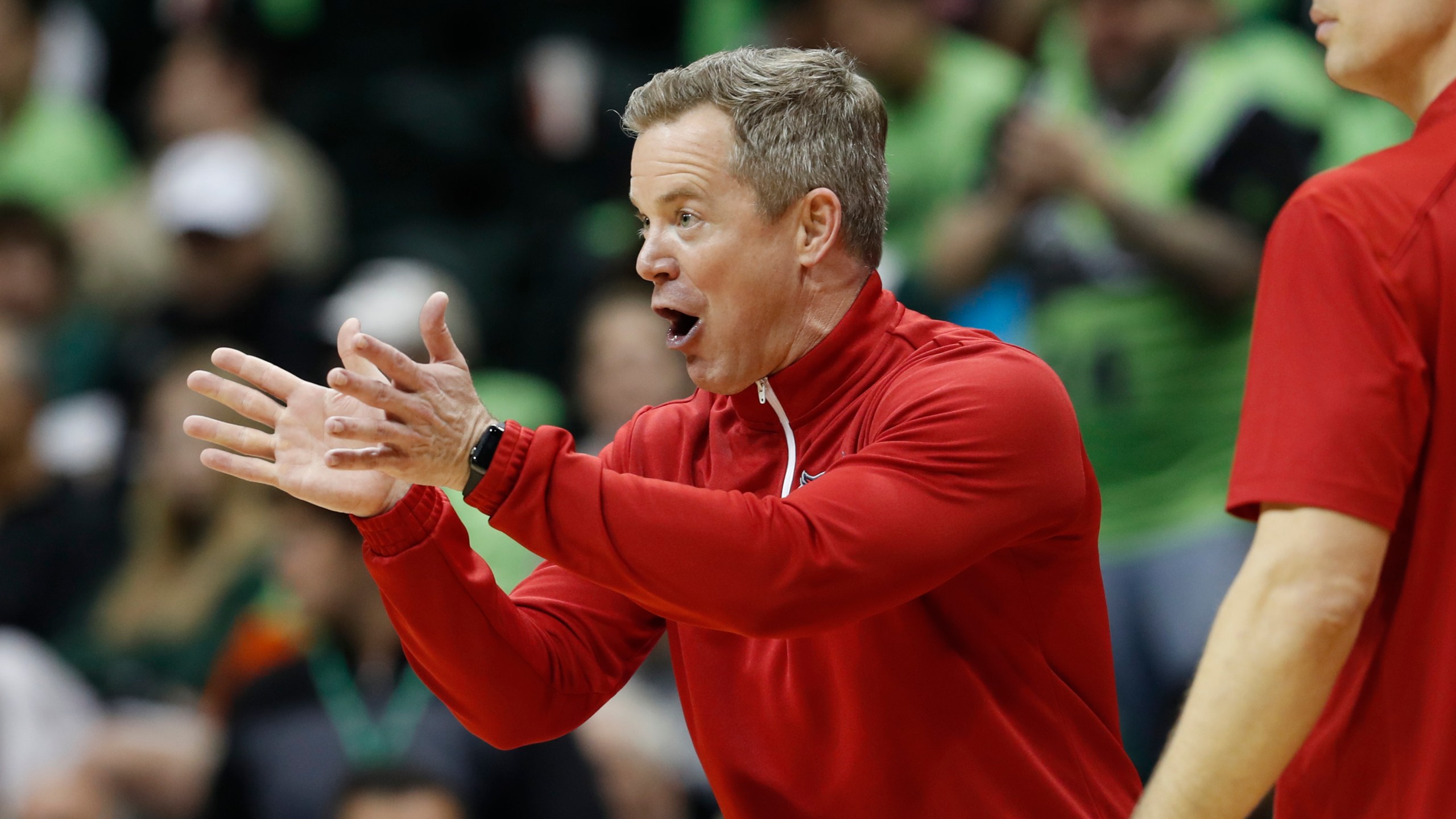 FILE - Florida Atlantic head coach Dusty May reacts during the second half of an NCAA college basketball game against South Florida, Sunday, Feb. 18, 2024, in Tampa, Fla. May is one of the hottest commodities in coaching. His name is been linked to openings at Louisville, Ohio State, Michigan and Vanderbilt. And his eight-seeded Owls start NCAA play Friday in New York against ninth-seeded Northwestern. (AP Photo/Scott Audette, File)