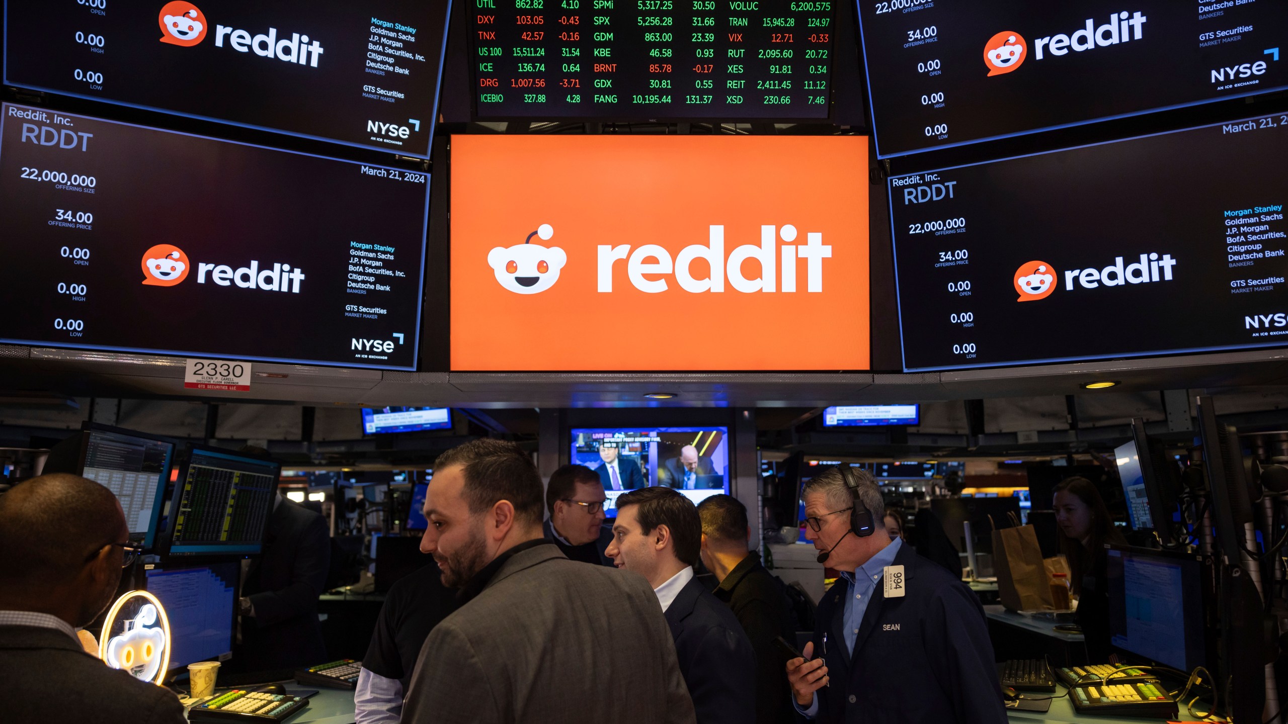 Reddit Inc. signage is seen on the New York Stock Exchange trading floor, prior to Reddit IPO, Thursday, March. 21, 2024. (AP Photo/Yuki Iwamura)