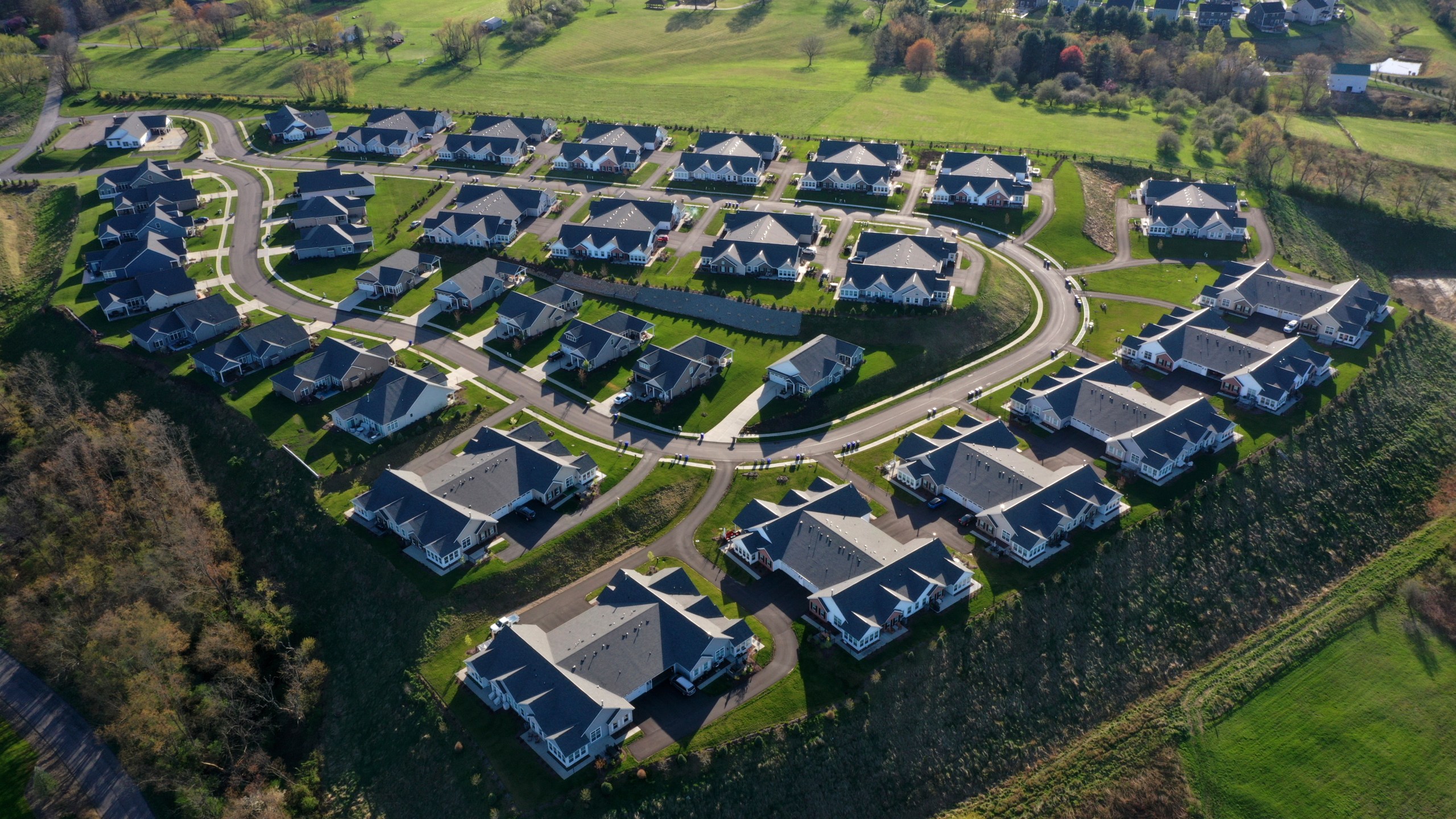 FILE - A development of new homes is shown in Middlesex Township, Pa., on Apr. 19, 2023. On Thursday, March 21, 2024, Freddie Mac reports on this week's average U.S. mortgage rates. (AP Photo/Gene J. Puskar, File)