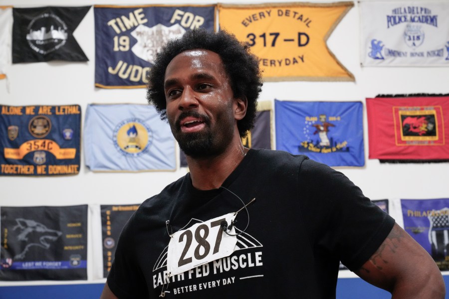 Philadelphia Police Academy applicant Curtis Cothran speaks during an interview after compleating the physical fitness entry exam in Philadelphia, Saturday, Feb. 24, 2024. The city has moved to lower requirements for the entry physical exam at its police academy as part of a broader effort nationally to reevaluate policies that keep law enforcement applicants out of the job pool amid a hiring crisis. (AP Photo/Matt Rourke)