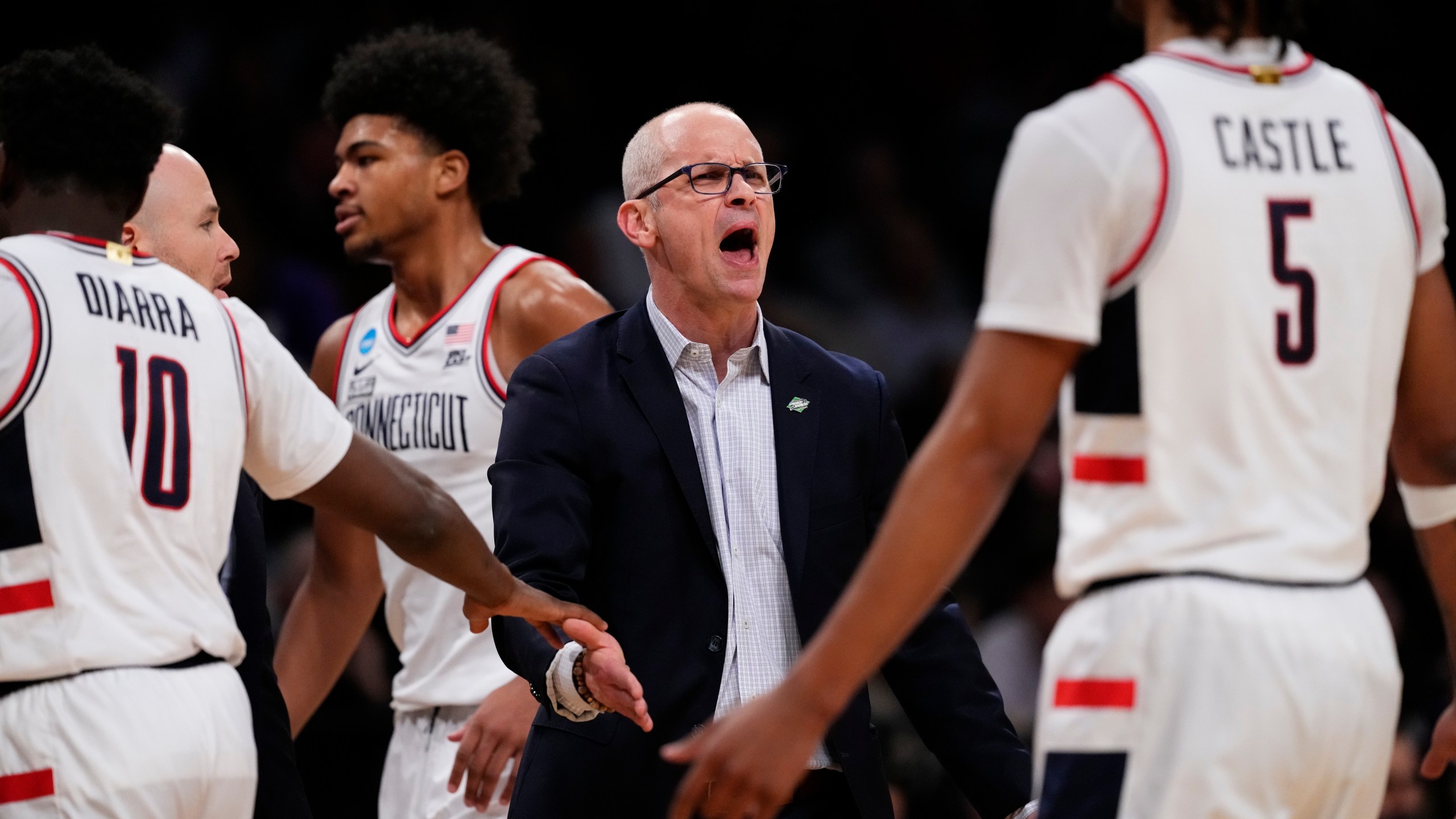 UConn head coach Dan Hurley talks to his players during a time-out in the first half of a first-round college basketball game against Stetson in the NCAA Tournament, Friday, March 22, 2024, in New York. (AP Photo/Frank Franklin II)