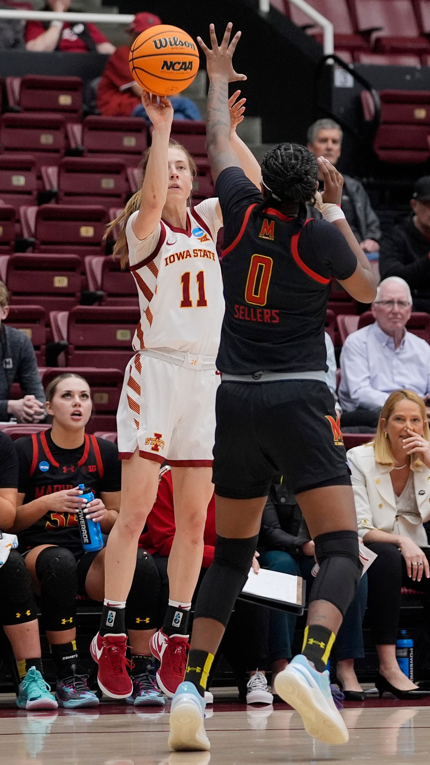 Iowa State guard Emily Ryan (11) shoots a 3-point basket over Maryland guard Shyanne Sellers (0) during the first half of a first-round college basketball game in the women's NCAA Tournament in Stanford, Calif., Friday, March 22, 2024. (AP Photo/Godofredo A. Vásquez)