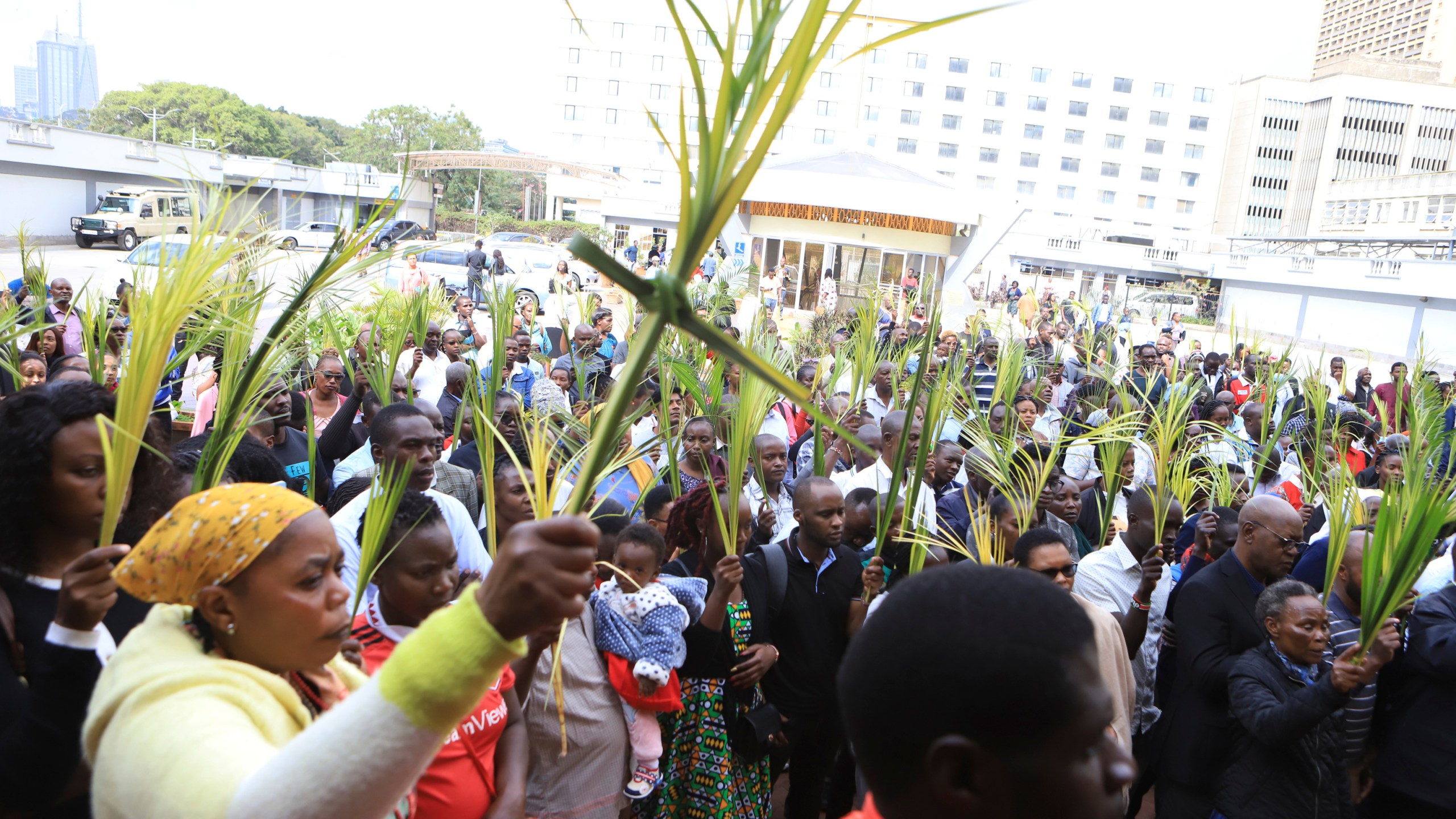 FILE - Christian faithful march carrying green Palm branches to commemorate Palm Sunday, which marks the entry of Jesus Christ into Jerusalem, in the streets of Nairobi, Kenya, Sunday, April 2, 2023. Palm Sunday will be celebrated by Christians worldwide Sunday, March 24, 2024. It commemorates the Christian belief in the triumphant entry of Jesus into Jerusalem, when palm branches were strewn before him. It marks the start of Holy Week. (AP Photo, File)