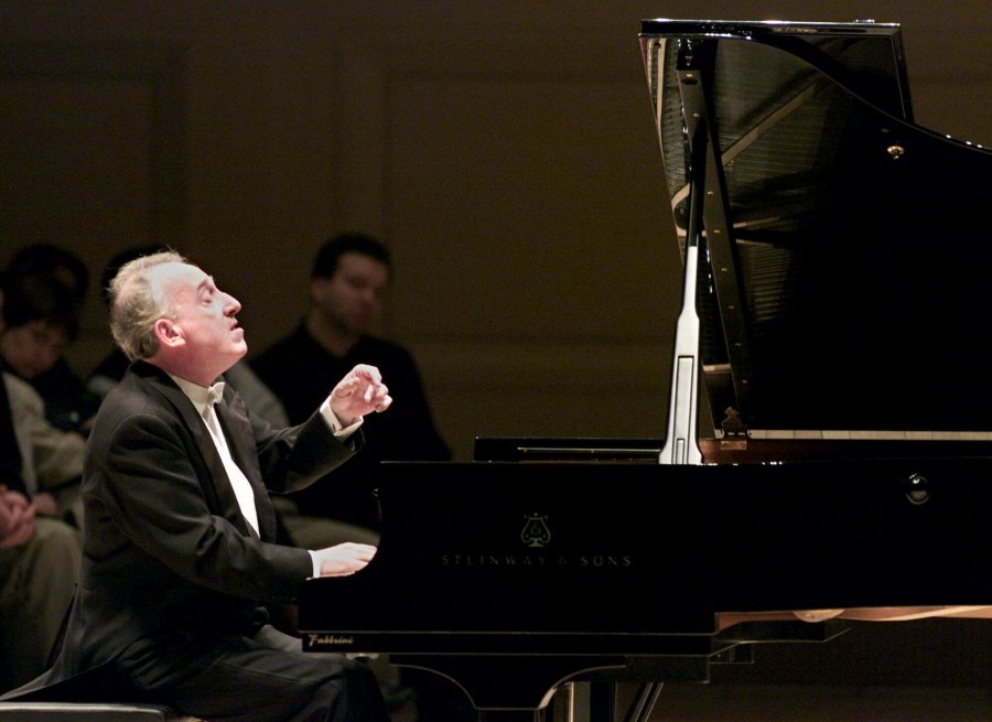 FILE - Pianist Maurizio Pollini performs at Carnegie Hall in New York Monday evening, March 19, 2001. Grammy-winning Italian pianist Maurizio Pollini has died. He was 82. Pollini performed frequently at Milan’s La Scala. The opera house said in a statement that he died on Saturday March 23, 2024, without giving a cause of death. (AP Photo/Robert Mecea, File)