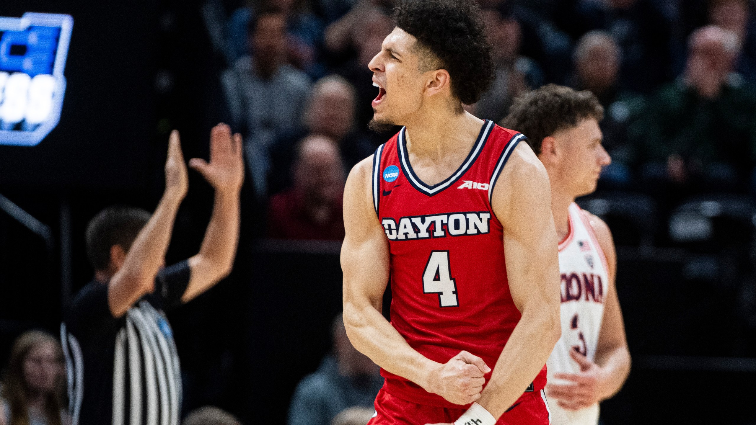Dayton guard Koby Brea (4) celebrates after making a basket against Arizona during the first half of a second-round college basketball game in the NCAA Tournament in Salt Lake City, Saturday, March 23, 2024. (AP Photo/Isaac Hale)