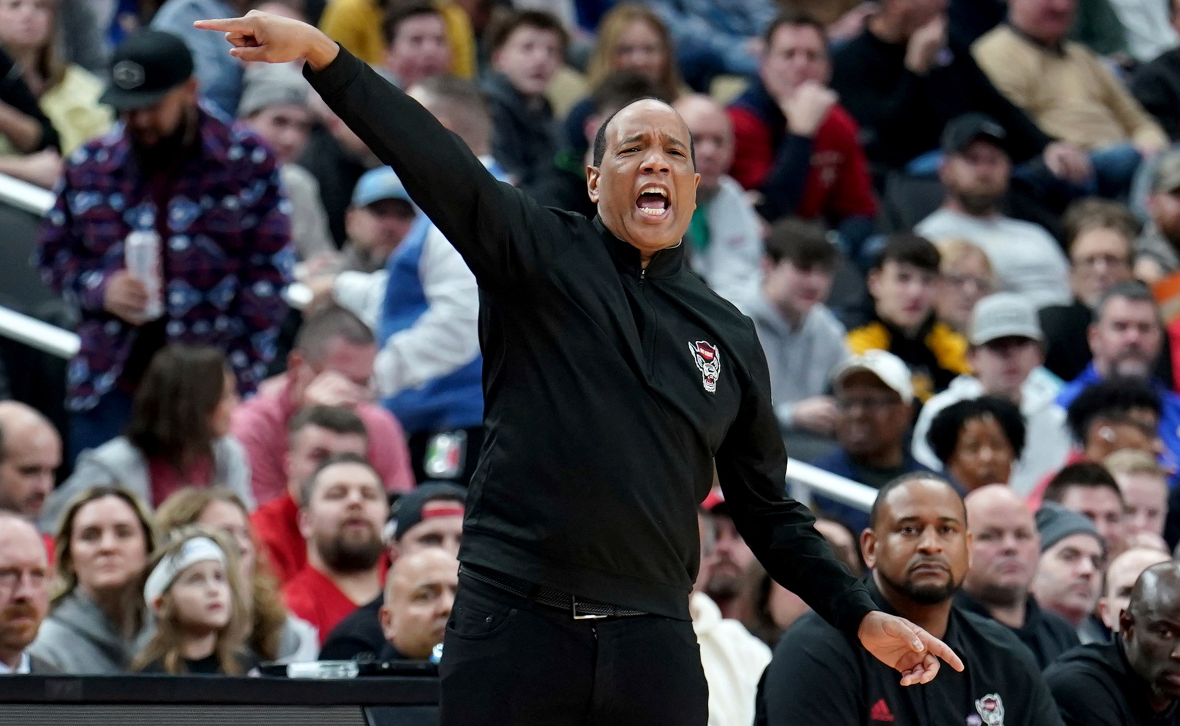 North Carolina State head coach Kevin Keatts calls out to his team during the first half of a second-round college basketball game in the NCAA Tournament against Oakland Saturday, March 23, 2024, in Pittsburgh. (AP Photo/Matt Freed)