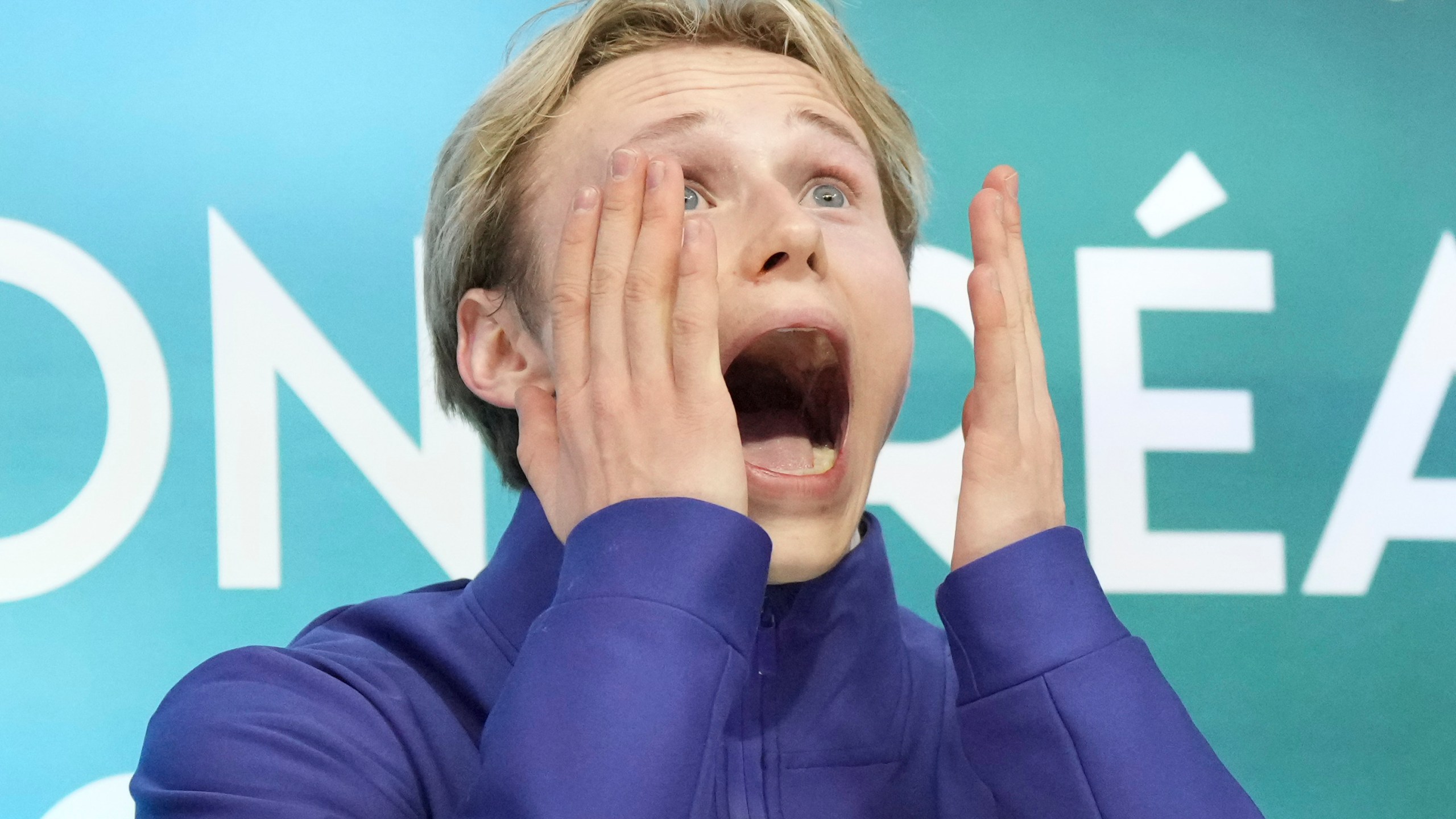 Ilia Malinin, of the United States, reacts following his free skate at the world figure skating championships Saturday, March 23, 3024, in Montreal. (Christinne Muschi/The Canadian Press via AP)
