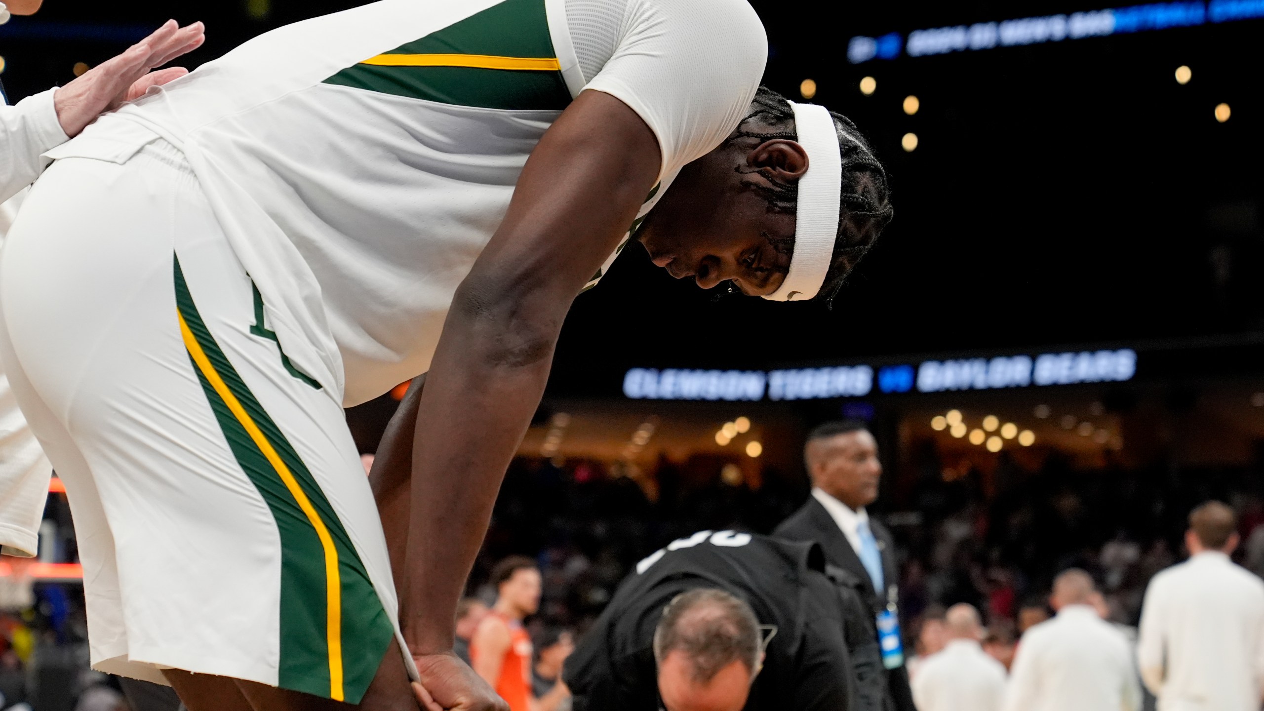 Baylor forward Josh Ojianwuna hangs his head after the team's 72-64 loss against Clemson in a second-round college basketball game in the NCAA Tournament, Sunday, March 24, 2024, in Memphis, Tenn. (AP Photo/George Walker IV)