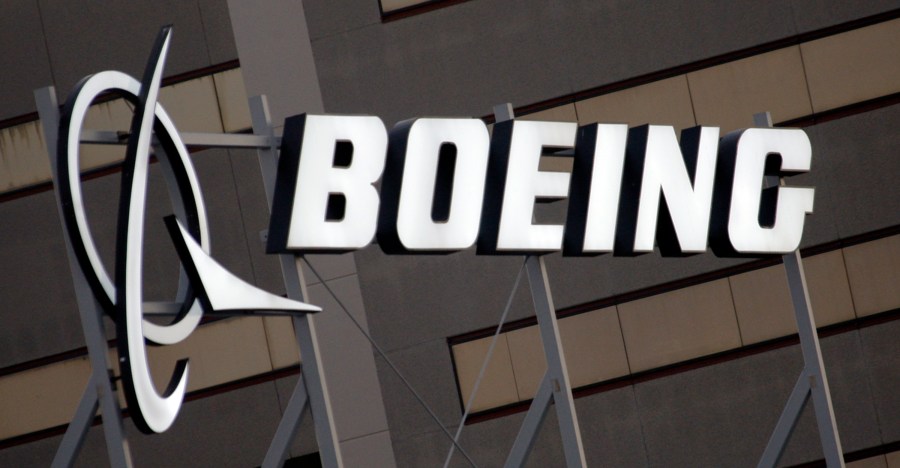 FILE - The Boeing logo is seen, Jan. 25, 2011, on the property in El Segundo, Calif. The American plane maker has been under intense pressure since early January, when a panel blew off a brand-new Alaska Airlines 737 Max midflight. That's spotlighted a lengthy series of safety and manufacturing problems that have piled up for Boeing over the years — including two devastating crashes that also involved Max jets. On Monday, March 25, 2024 Boeing announced that CEO David Calhoun would be stepping down from his post at the end of the year as part of broader management changes. (AP Photo/Reed Saxon, File)