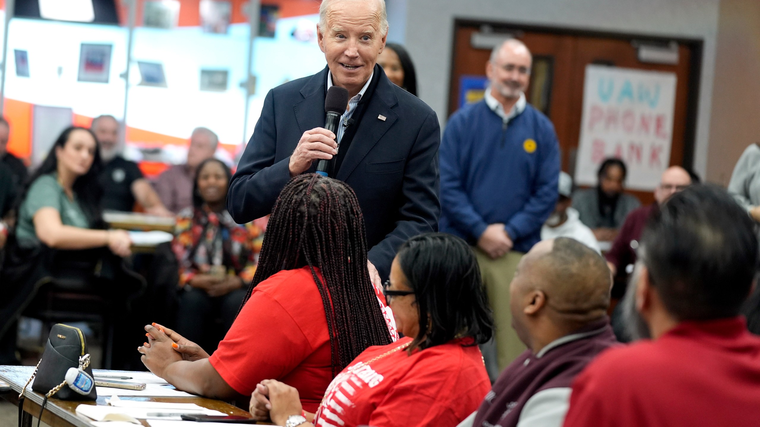 FILE - President Joe Biden addresses UAW members during a campaign stop, Feb. 1, 2024, in Warren, Mich. Former President Donald Trump is urging Republicans in Michigan to target Black voters in Detroit and other predominantly African American areas in the swing state, state GOP leaders said Monday, March 25. Both Biden and Trump will hotly contest Michigan, a state that flipped Democratic in 2020 and is widely seen as critical to both candidates' chances in November. (AP Photo/Evan Vucci, File)