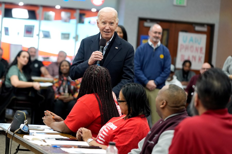 FILE - President Joe Biden addresses UAW members during a campaign stop, Feb. 1, 2024, in Warren, Mich. Former President Donald Trump is urging Republicans in Michigan to target Black voters in Detroit and other predominantly African American areas in the swing state, state GOP leaders said Monday, March 25. Both Biden and Trump will hotly contest Michigan, a state that flipped Democratic in 2020 and is widely seen as critical to both candidates' chances in November. (AP Photo/Evan Vucci, File)