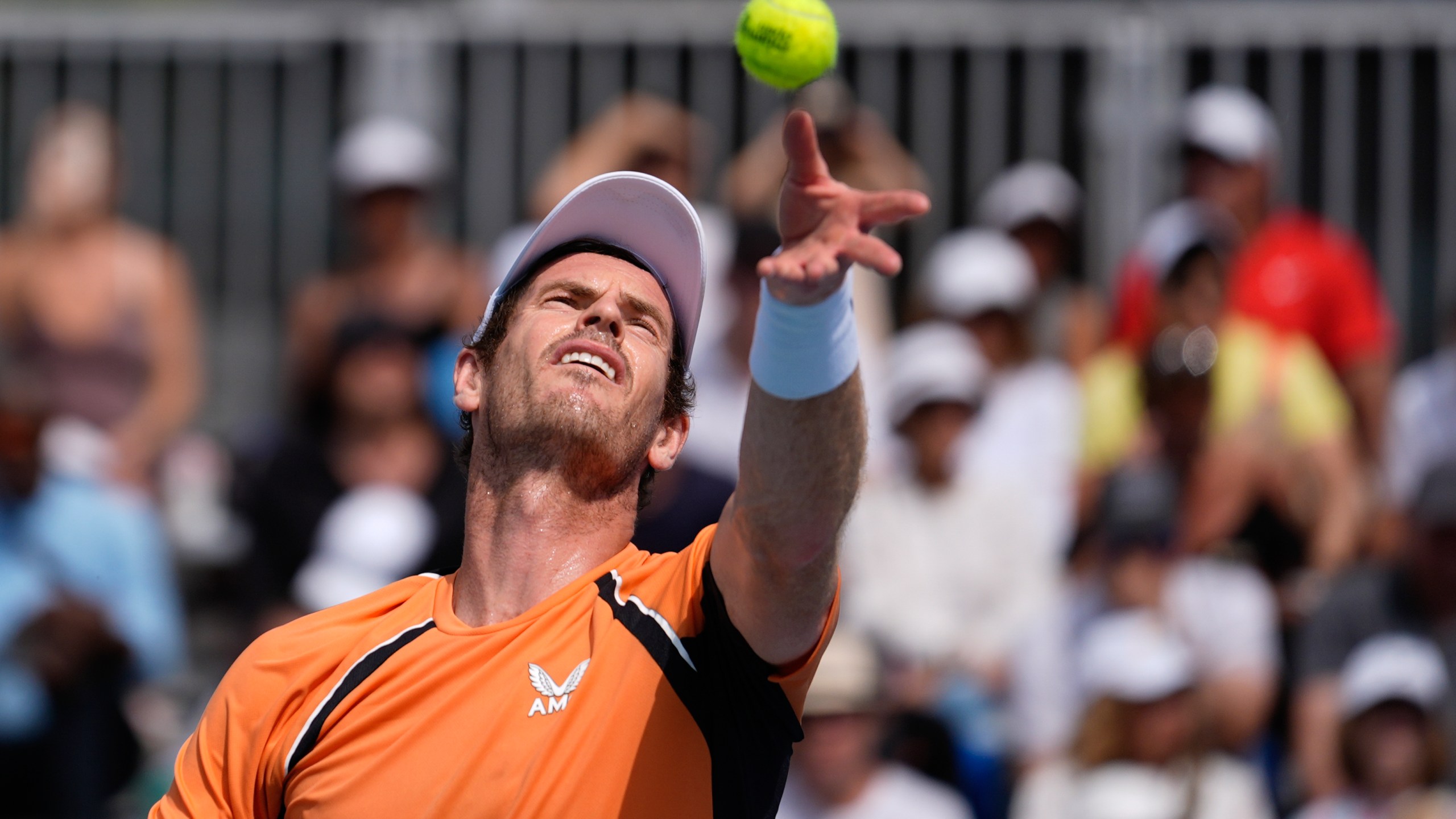 Andy Murray, of Great Britain, serves to Tomas Machac, of Czech Republic, in their men's third round match at the Miami Open tennis tournament, Sunday, March 24, 2024, in Miami Gardens, Fla. (AP Photo/Rebecca Blackwell)