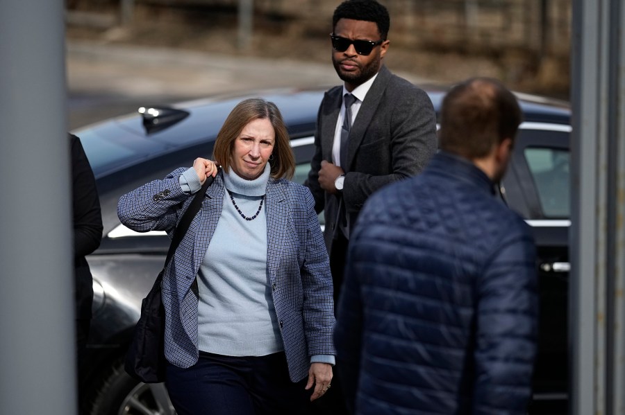 U.S. Ambassador to Russia Lynne Tracy, left, enters the Moscow City Court to attend hearing on Wall Street Journal reporter Evan Gershkovich's case, in Moscow, Russia, on Tuesday, March 26, 2024. A court in Moscow considers the extension of the pre-trial detention of Wall Street Journal reporter Evan Gershkovich, arrested on espionage charges. The current arrest term of Gershkovich runs out on March 30, 2024. (AP Photo/Alexander Zemlianichenko)