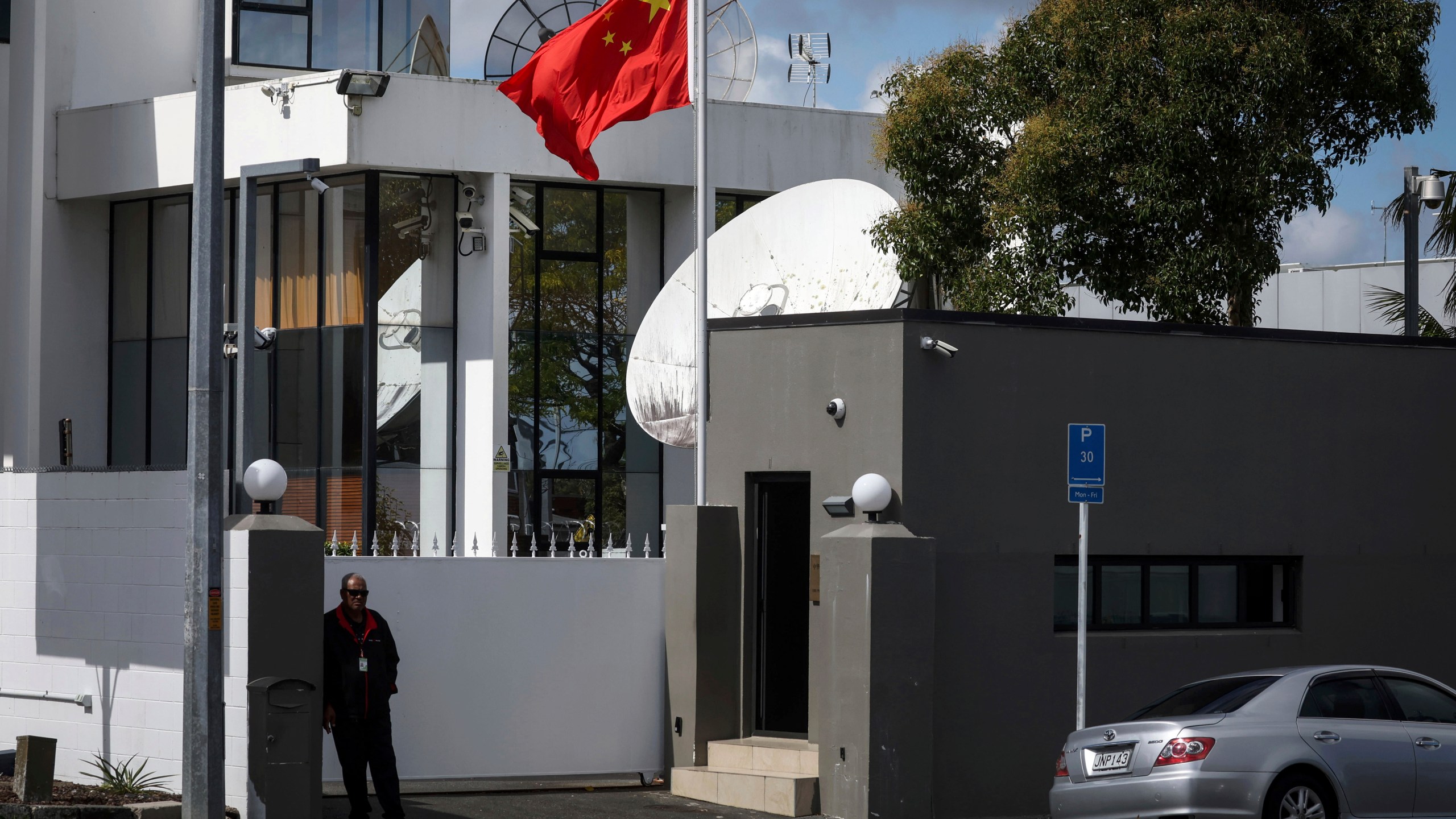 The Chinese flag flies at the Chinese Consulate in Auckland, New Zealand, Tuesday, March 26, 2024. Hackers linked to the Chinese government launched a state-sponsored operation that targeted New Zealand's Parliament in 2021, the country's security minister said. (Jason Oxenham/New Zealand Herald via AP)