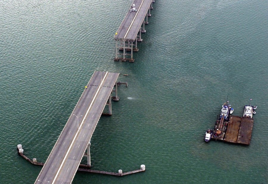 FILE - A section of the Queen Isabella Causeway is shown missing as crews break from their search and rescue due to a stormm in Port Isabella, Texas on Saturday, Sept. 15, 2001. A container ship struck a major bridge in Baltimore early Tuesday, March 26, 2024, causing it to plunge into the river below. From 1960 to 2015, there have been 35 major bridge collapses worldwide due to ship or barge collision (AP Photo/Eric Gay, File)