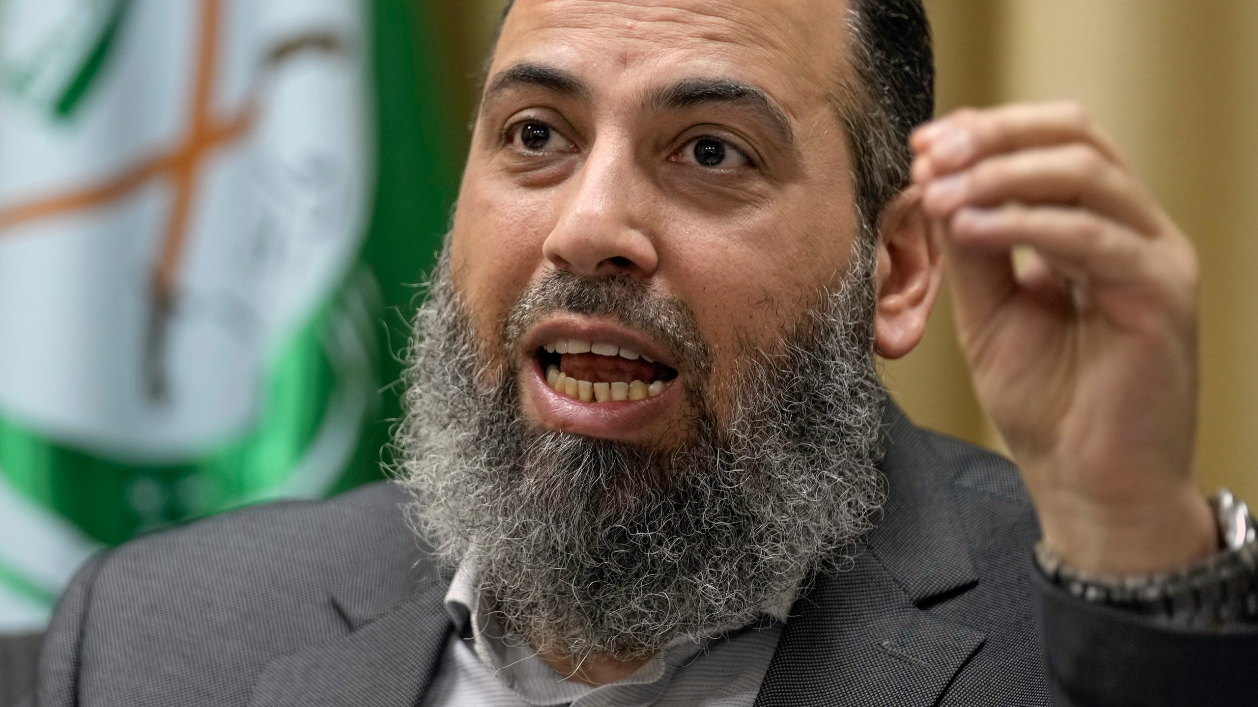 The Secretary-General of the Islamic Group Sheikh Mohammed Takkoush, speaks during an interview with The Associated Press in Beirut, Lebanon, Tuesday, March 26, 2024. Takkoush allied with Hamas and Hezbollah said Tuesday they are closely coordinating with both groups along the southern border with Israel where they have claimed responsibility for several attacks over the past months. (AP Photo/Bilal Hussein)