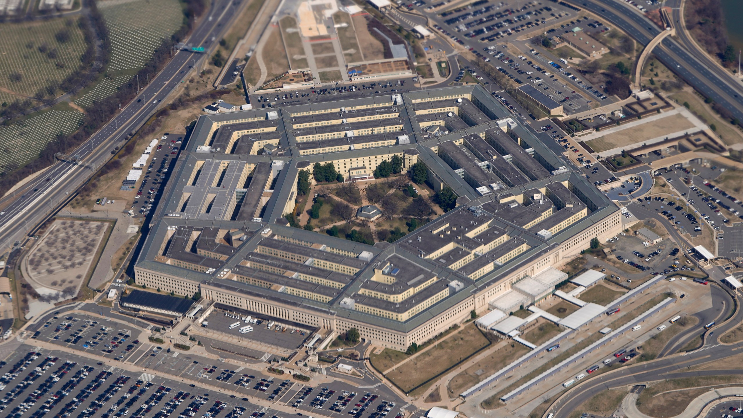 FILE - The Pentagon is seen from Air Force One as it flies over Washington, March 2, 2022. A new Pentagon study that examined reported sightings of UFOs over nearly the last century has found no evidence of aliens or extraterrestrial intelligence. That conclusion is consistent with past U.S. government efforts to assess the accuracy of claims that have captivated public attention for decades. (AP Photo/Patrick Semansky, File)