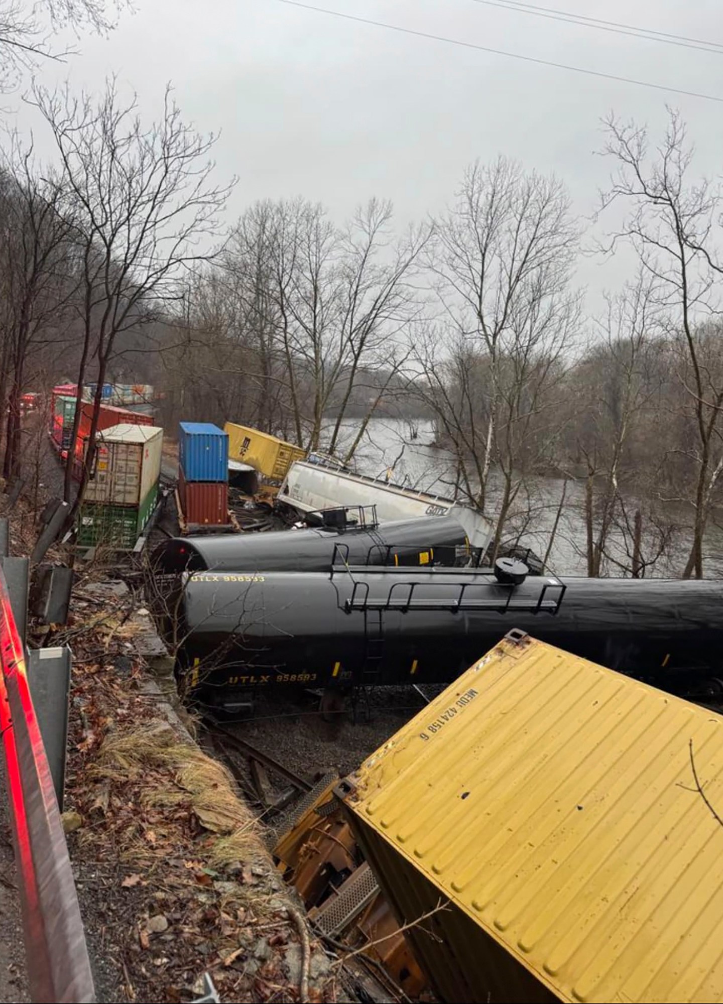 FILE - This photo provided by Nancy Run Fire Company shows a train derailment along a riverbank in Saucon Township, Pa., March 2, 2024. The collision highlights the shortcomings of the automated braking system that was created to prevent such crashes. None of the circumstances the National Transportation Safety Board described Tuesday, March 26, in its preliminary report on the derailment would have triggered the automated positive train control system to stop the trains. (Nancy Run Fire Company via AP, File)