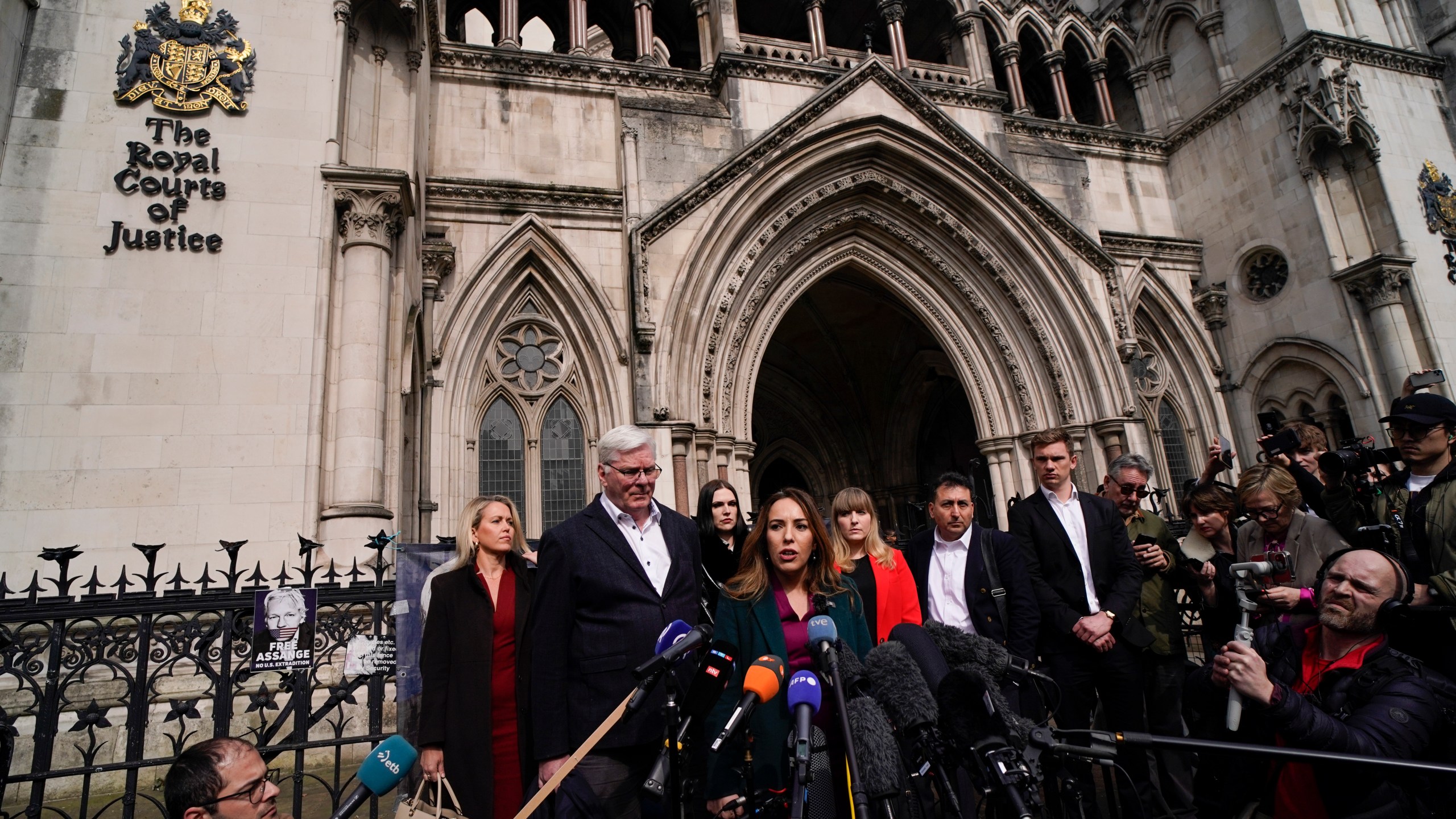 Stella Assange, wife of Wikileaks founder Julian Assange, releases a statement outside the Royal Courts of Justice, in London, Tuesday, March 26, 2024. Two High Court judges said they would grant Assange a new appeal unless U.S. authorities give further assurances about what will happen to him. The case has been adjourned until May 20.(AP Photo/Alberto Pezzali)