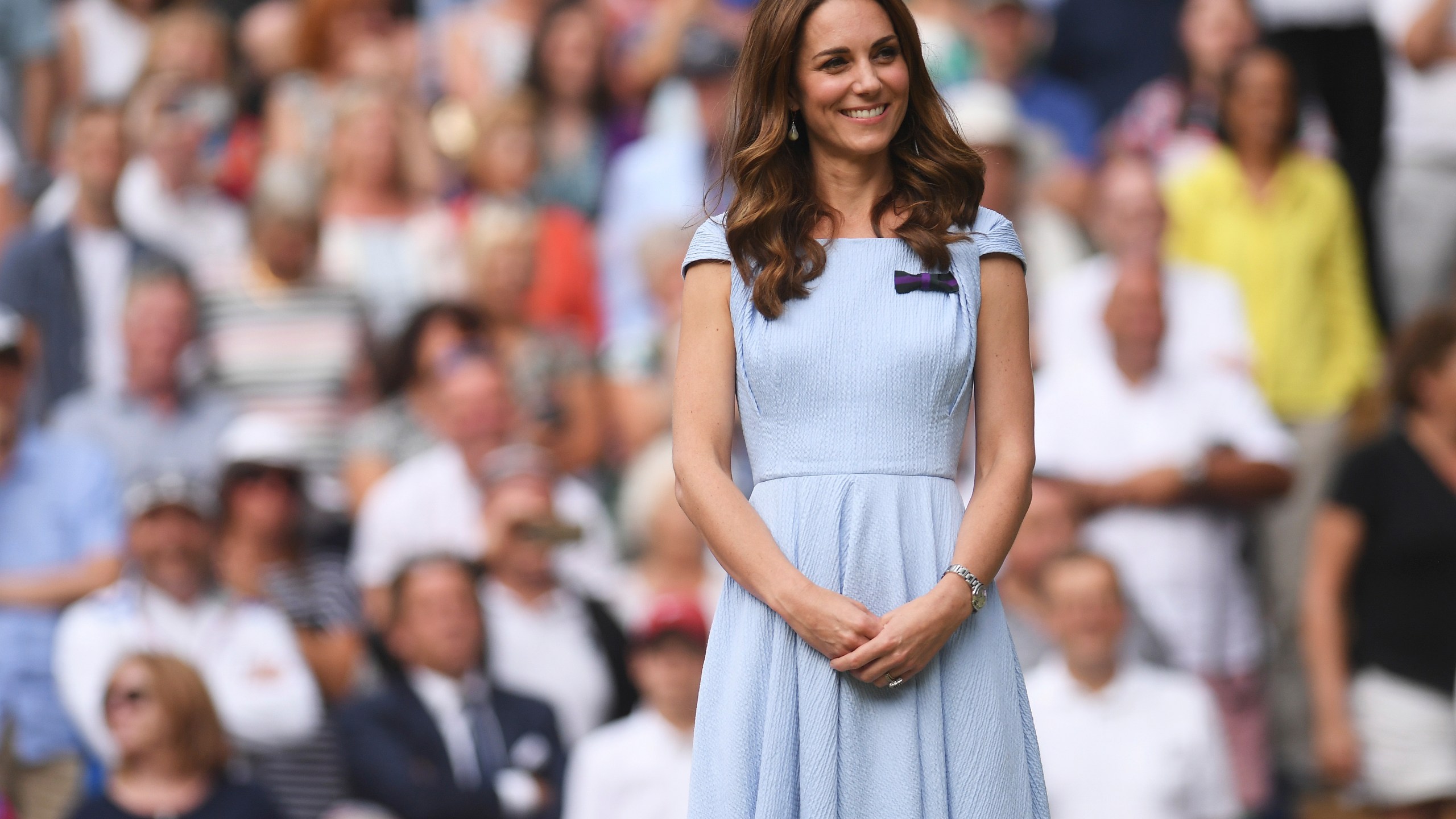 Britain's Kate, Duchess of Cambridge stands on centre court during the trophy presentation after Serbia's Novak Djokovic defeated Switzerland's Roger Federer during the men's singles final match of the Wimbledon Tennis Championships in London, Sunday, July 14, 2019. (Laurence Griffiths/Pool Photo via AP, File)