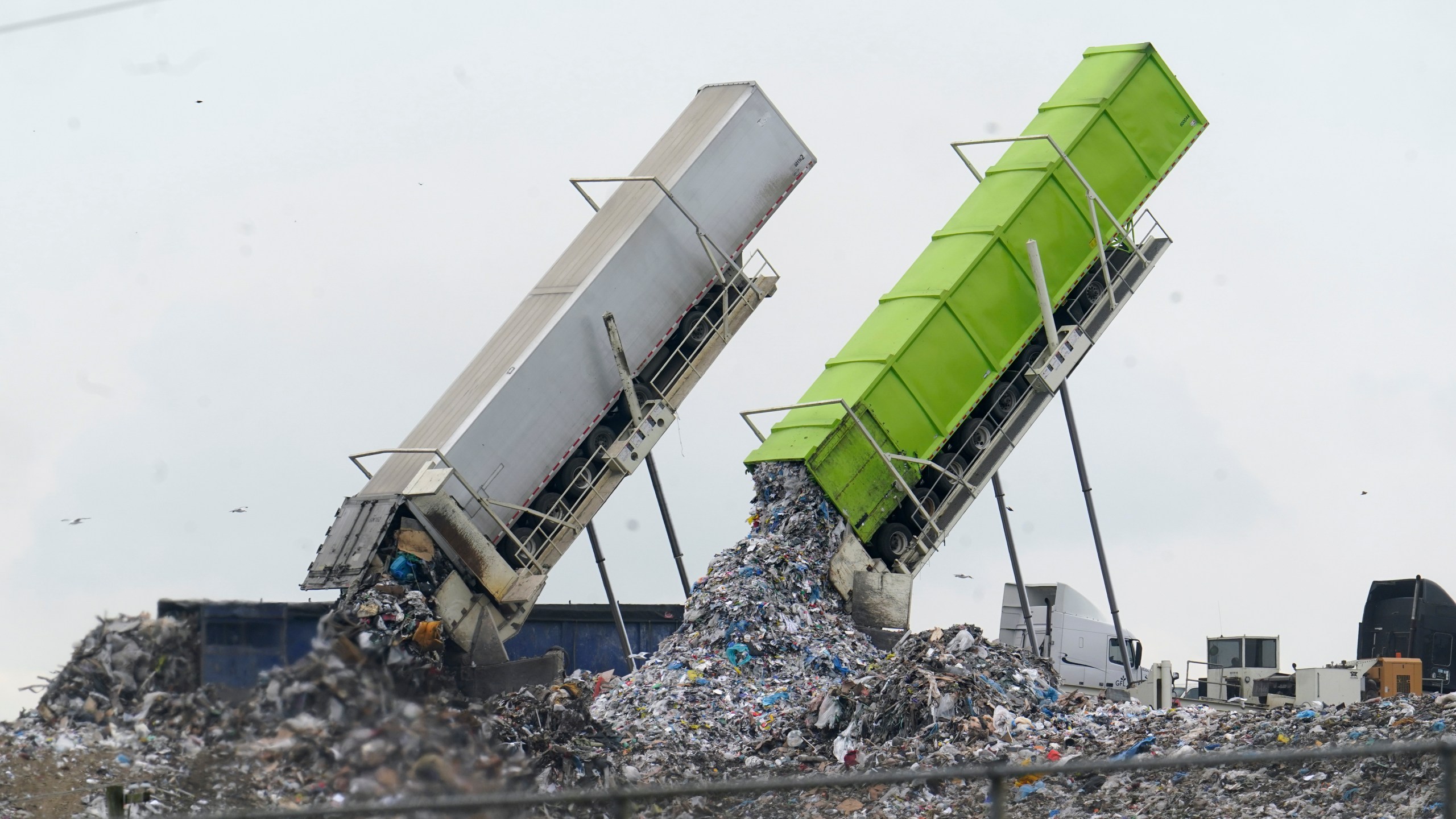 FILE - Garbage is loaded into a landfill in Lenox Township, Mich., July 28, 2022. A new United Nations report estimates that 19% of the food produced around the world went to waste in 2022. (AP Photo/Paul Sancya, File)